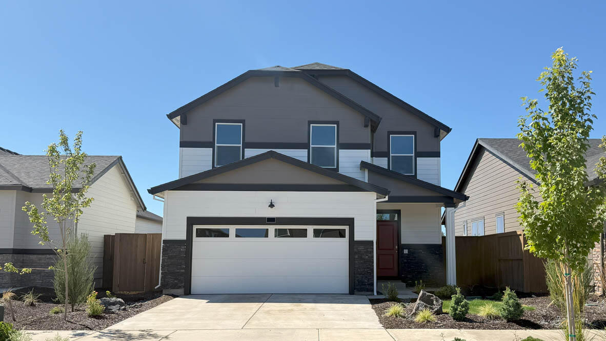 Move-in new construction in Bend! Stevens Ranch in Bend is your gateway to serene living near Reed Market Rd, close to nature and historic downtown. This magnificent Porter two-story floor plan has 5 beds, 3 baths, with a bed and bath on the main floor that is ideal for an at-home office or a guest bedroom. The great room has designer features with a fireplace. The lavish kitchen has beautiful shaker cabinetry, quartz countertops with backsplash, and stainless-steel appliances like a gas range/oven and microwave. The primary bedroom is spacious, it has a walk-in closet, and an en suite bathroom with a double vanity. The hall bathroom adds extra comfort with a double vanity as well. 

Special interest rate promo and closing cost credit offered with preferred seller. Call for details. Sales office hours are 10am - 5:30pm daily. Photos are representative of plan, features/specs may vary.