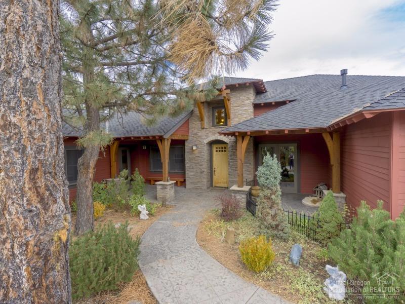 This beautiful home overlooks the Deschutes River & River Trail. Secluded by mature pine trees w/privacy. Features: huge master suite with elegant bath; large gourmet kitchen with slab granite, hardwoods, custom tile & stainless appliances! Separate living room, formal dining, great separation. Large deck for entertaining, Anderson iron clad windows & doors, 2 car garage & single car garage w/picture window. Could easily be an office/gym/studio! Community offers: private pools, clubhouse, common areas.