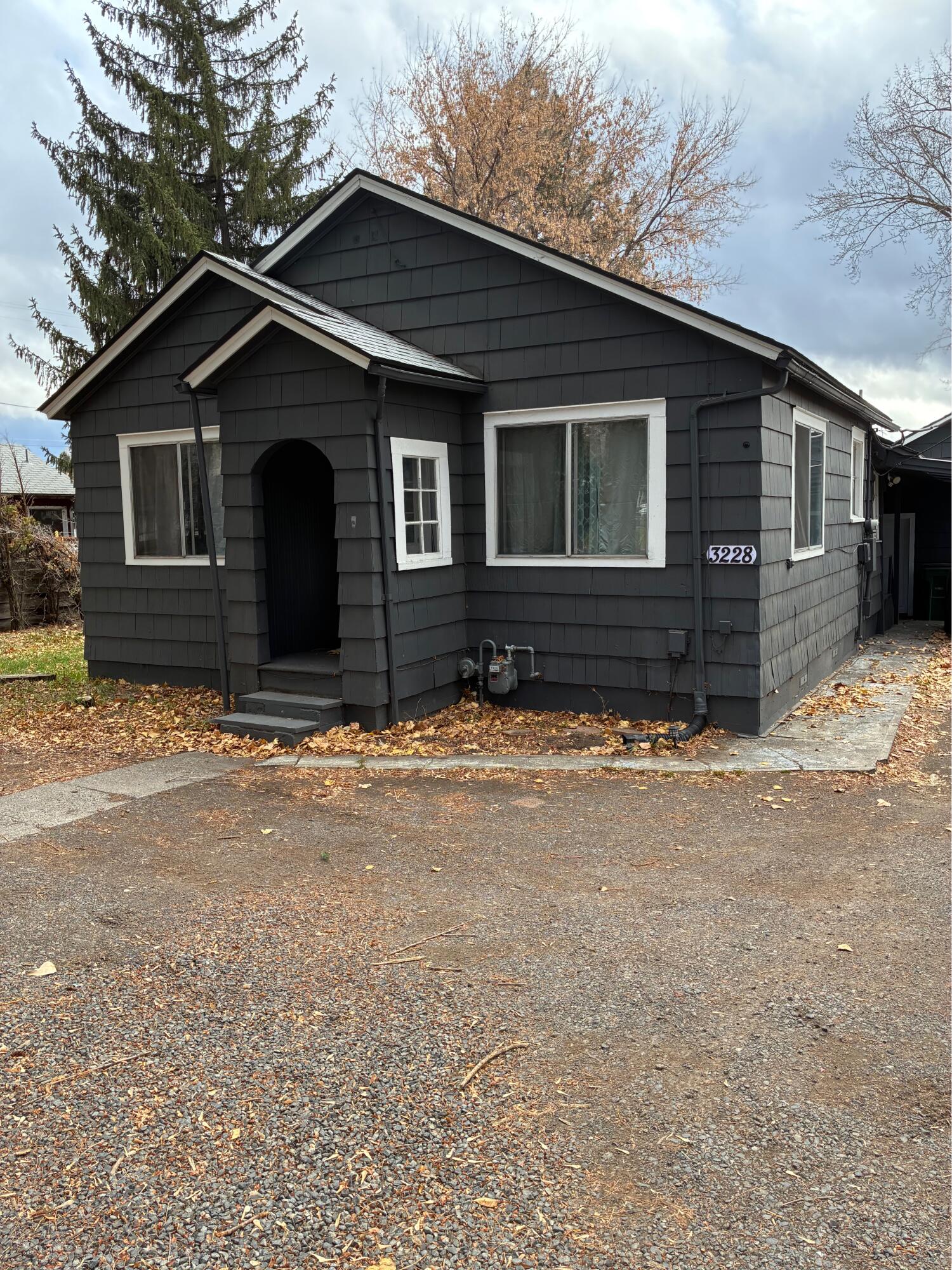 Nice little 3 bedroom on 0.33-acre lot. Detached oversized 1 car garage has shop and serval attached rooms behind garage/shop. Assorted fruit trees in yard. Home is clean and ready for new owner or rent out.