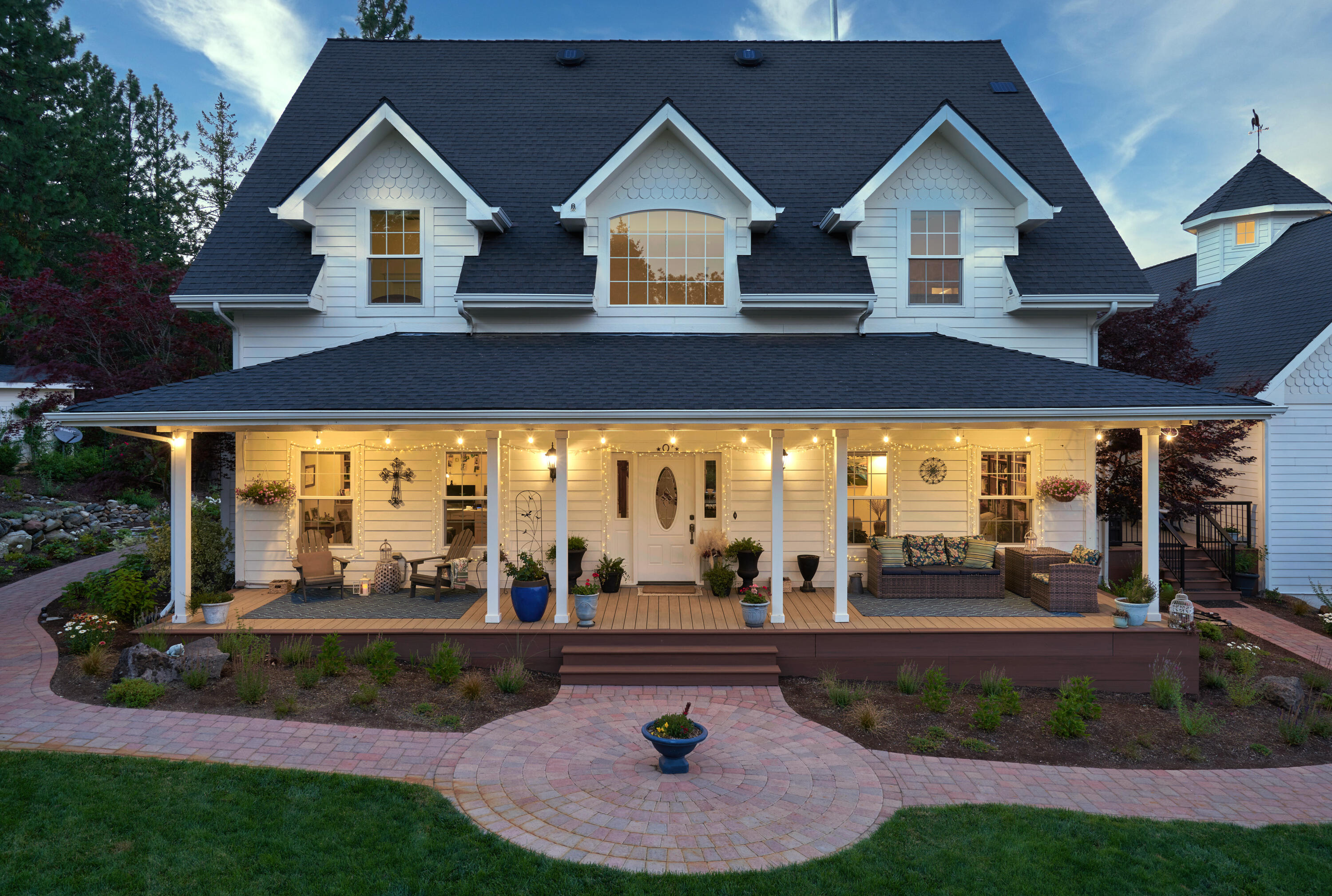 Elegant, custom colonial home w/ unparalleled craftsmanship, exceptional amenities & mountain views. 5 minutes from   Jacksonville, gated w/deer-fencing on 10 acres. Polysteel, fire-resistant 4123 sqft house w/extensive millwork, crown molding, hardwood floors, high ceilings, window seats & gas fireplace. Custom kitchen w/granite counters, butcher-block island, warming drawer, prep sink, Thermador propane stove, wine fridge & butler pantry. Sunny dining room w/skylights, lg picture windows & views of gardens & forest. Luxurious, ground-floor master suite has dual walk-in closets, heated bathroom floors, lg jetted tub. 3 additional bdrms (one master) on second level w/588 sqft finished bonus room above 3-car garage. Professionally landscaped w/new drip system, low-water pollinator gardens w/seasonal interest, raised vegetable gardens, fruit trees, berry patch, flagstone patio with waterfall and lilly pond, rose gardens, paved walking paths. Large porch and deck w/kitchen, BBQ, hot tub.