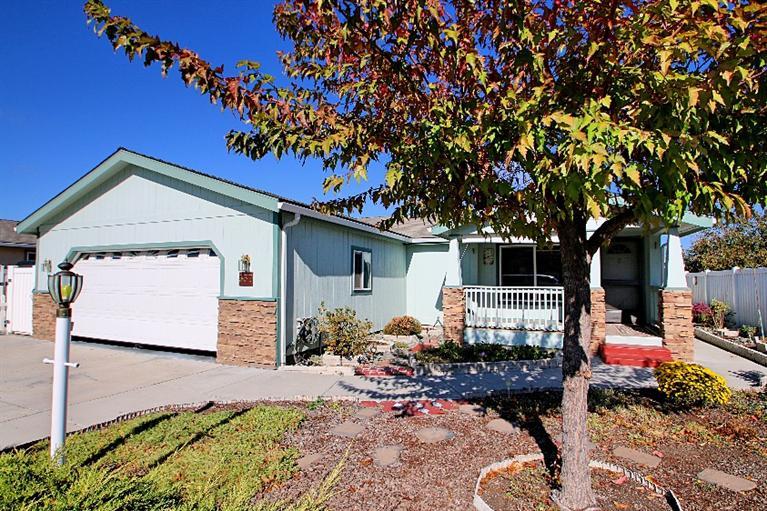 Welcome to one of the most desired 55+ parks in the valley! Located near city services and shopping, with attention give to every detail of this wonderful neighborhood! This home is in great condition and pride of ownership show throughout. From the moment you pull up out front, you are met with charm and quality. The living areas have high soaring ceilings and are very open, spacious and bright. The bedrooms are huge, with plenty of closet space, and there is nice amount of storage throughout the home. The back yard is low maintenance, with a shady patio and a well kept shed. This is a neighborhood that prides itself on the care shown by the residents for their homes. Come enjoy the walks around the loop in the morning and gathering in the common area in the evening! RV parking is available within the park.