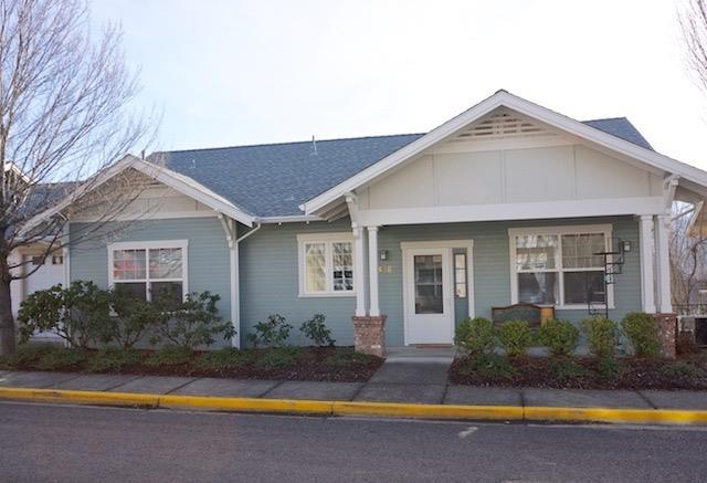 Exception views of Ashland and surrounding hills in this top floor condominium home! This feels like a single family home with entry from the street and the garage, covered front porch and large balcony off the living room. Glistening hardwood floors welcome you and a gas fireplace for those cool, winter days. Interior painting just completed in late 2016. Unit has new roof as of 2014 and recently been painted on exterior as well. Large master suite, walk-in closet and even a frosted window in the bathroom for natural light. Close to the clubhouse and community dining room too. Great opportunity -- these do not come along very often so do not miss seeing this beautiful property.