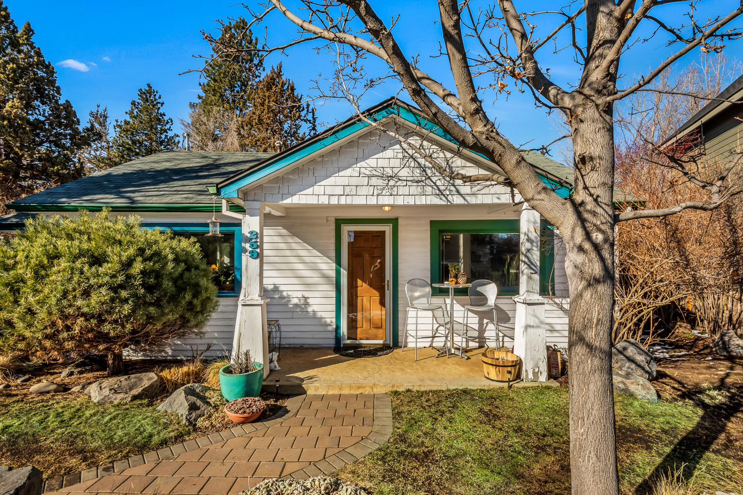 Premier downtown location with superb access to downtown Bend, the Deschutes River and the Galveston business corridor.  Charming craftsman bungalow nestled on Bend's westside, featuring hardwood flooring & generous windows.  Kitchen opens up to dining area and living room.  Expansive unfinished basement for additional storage.  Paver walkway leads to a covered front porch, perfect for enjoying this close in neighborhood.  Landscaped and fenced yard with patio off the dining room for entertaining.  Excellent opportunity to invest in a coveted, core area of Bend.