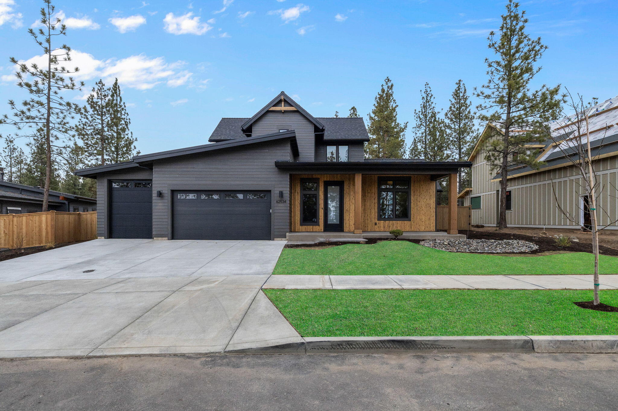 Welcome to another exquisite NW contemporary home by Bruce Wiechert Custom Homes, Inc., located in the
 desirable Shevlin West neighborhood. This meticulously crafted home blends modern luxury with
 thoughtful design, featuring an open floor plan that effortlessly combines elegance and comfort.
 Stunning wood beams, beautiful wood flooring, and vaulted ceilings create an inviting and spacious
 atmosphere. The heart of the home is a gourmet kitchen with custom rift oak cabinetry, an expansive
 island with a waterfall quartz countertop, and premium SS appliances. Sunlight streams
 through large windows, highlighting the home's flawless craftsmanship. With 4 spacious bedrooms, some
 offering Cascade Mountain views, a bonus room, and a 3-car garage: main 8ftx16ft, third stall 7.6ftx10ft. this home has it all.
 Outside, enjoy multiple entertainment spaces, full landscaping, and a fenced level lot. Discover luxury living in Shevlin West today!