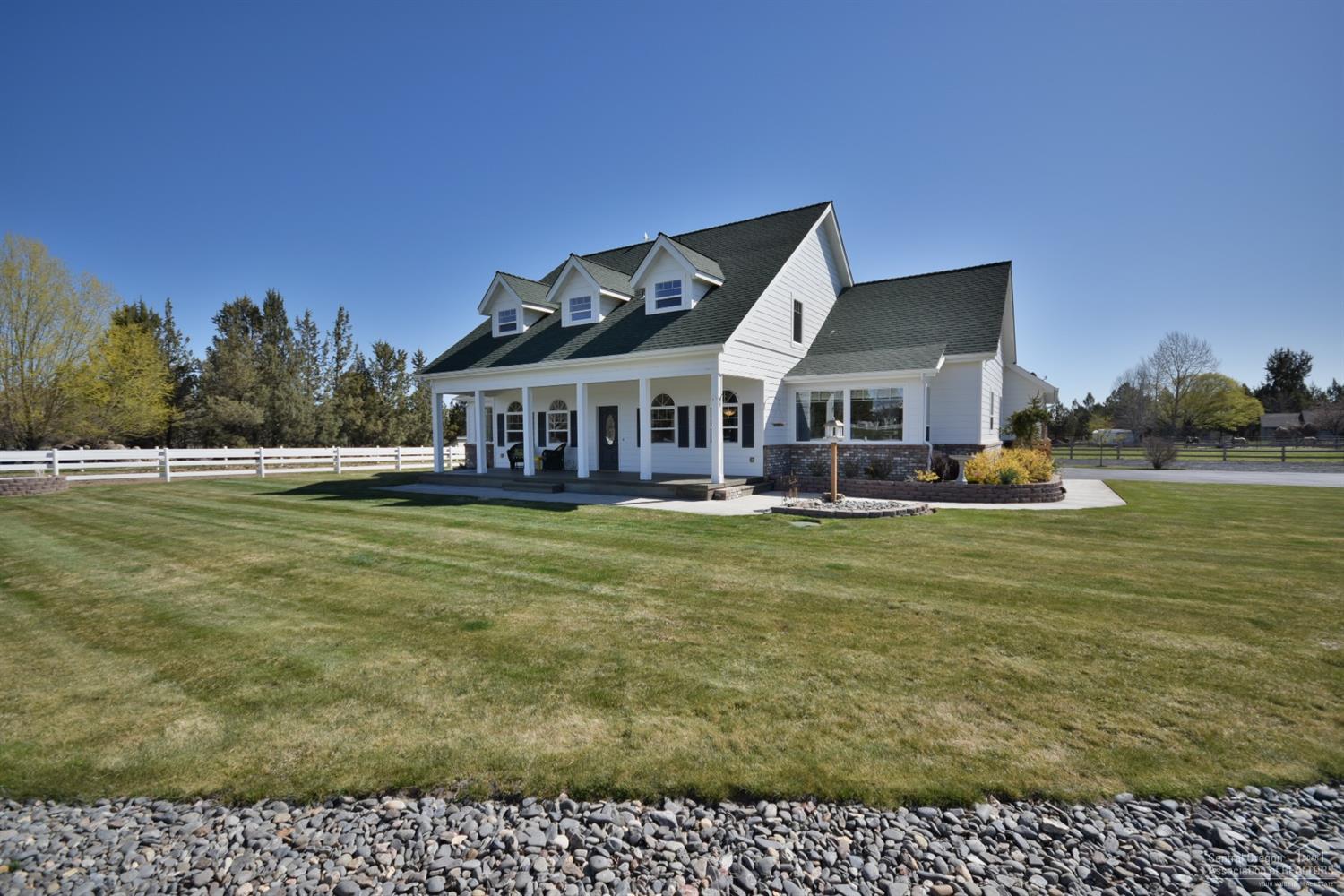 Beautiful Tumalo Home on 4.74 acres with Cascade Mtn Views, 2 ponds & underground irrigation! Great horse set up with quality fencing and barn. The home features a gorgeous kitchen with granite, stainless appliances, eating bar & breakfast nook. The family room has an Xtrordinair gas fireplace with large rock hearth & surround. Luxurious master suites on each level. Lots of storage and bonus areas throughout. Great outdoor living & very private. This house and property would be a great place to call home.