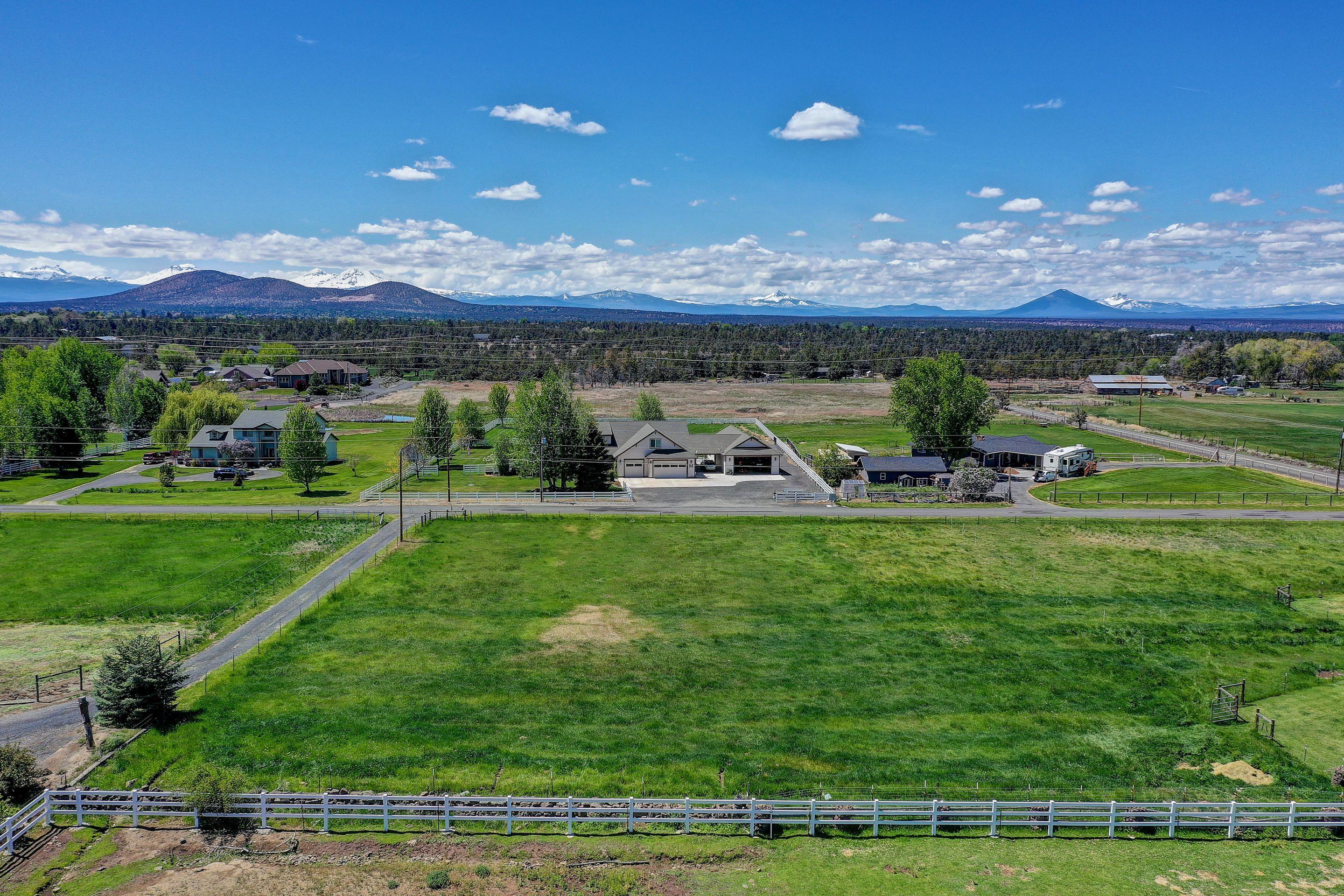 This .99 acre lot has tons of opportunity and the possibilities are endless! Not only is it located inside Redmond City limits and just minutes from downtown Redmond, this fenced vacant lot has beautiful panoramic views of the Cascade mountains! This can be an investment property or you can build your forever home!