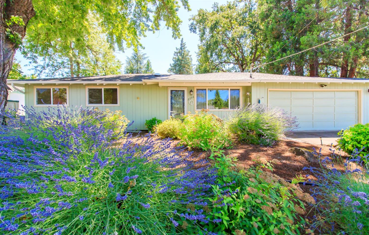 Looking to downsize or just starting out? This 2 bedroom, 2 bath home is ready for you to call home! Built in 1964 with 1376 sq. feet, this home offers a living room with hardwood floors and solar tube, kitchen with granite counters and cabinet with slide outs, slider to enclosed flex room with a wall of windows, laminate flooring, ceiling fan, garden window and separate entrance, which would work well for a home office, or? Hall bath has updated vanity with tub/shower, second bedroom has hardwood flooring and is extra large. Master has ceiling fan and french door with side lights that leads to the covered patio with UV blocking skylights, ceiling fan and is wired for a hot tub. Situated on a .28 acre lot that is beautifully landscaped front and back. ...Welcome Home!