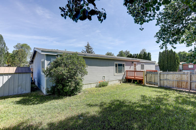 The lowest priced 4 bed 2 bath manufactured home in Redmond.  Come see this beautiful updated single level home in NW Redmond. You will love this extensively remodeled home on a large fenced lot. The home features Updated Bathrooms, New Flooring, New Carpet, New Kitchen Sink, New Range Oven/Vent Hood, New Front and Back Decks, A/C, New Electrical, New Light Fixtures Throughout, Storage Shed and Room to Park an RV/Boat/Utility Trailer.  Close & Conveniently to schools, parks and shopping.  Call your realtor today to schedule your private showing.