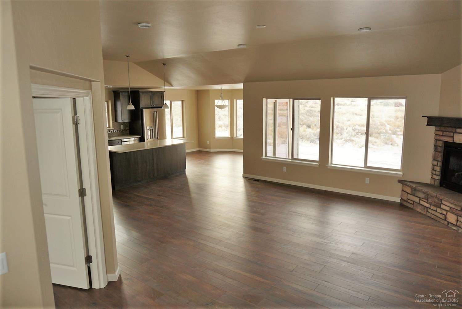 Wonderful, single level home on 2 acres! This 3 bd, 2 bth home is perfect for those looking for a new, affordable, custom home with room for the family and hobbies. Any cook will love the large, open kitchen with stainless steel appliances and island. Enjoy 3rd bedroom or den/office option. Beautiful, front yard landscaping. Call today!!!