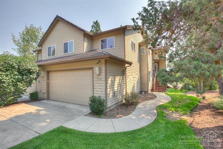 Rare riverfront townhome 40 ft from the Deschutes River in Bend. Marble floor entry. Vaulted, light and contemporary living room with gas fireplace, river views & elevated deck. Dining room, beautiful kitchen with marble flooring, eating bar & pantry. Two bedrooms & full bath on main level. Loft overlooking living room. Lower level: large master suite on the river with deck, jetted tub, oversized shower and walk-in closet. Family room & powder room. Double garage, A/C & tile roof.