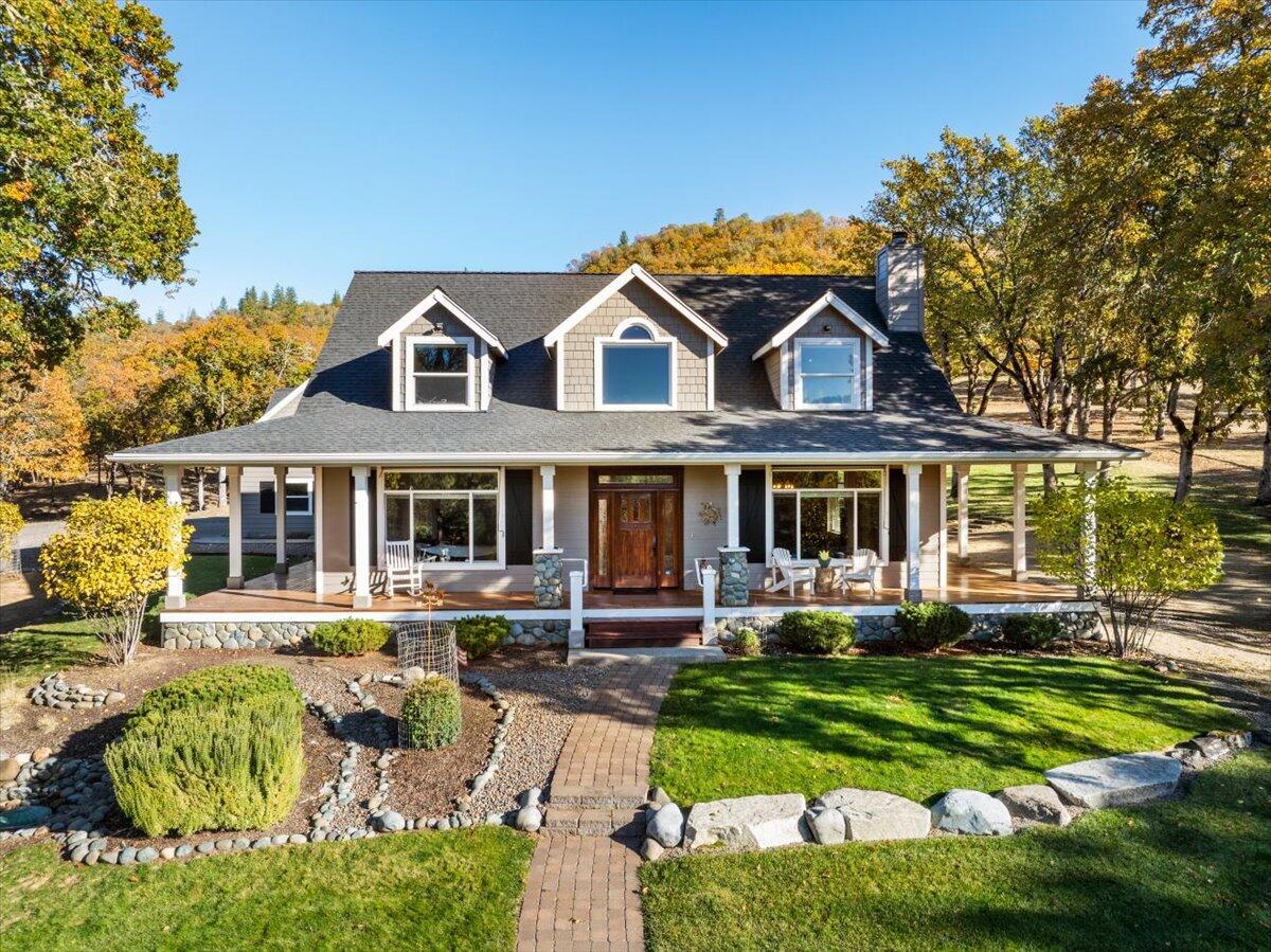 55+ Private Rolling Acres with a beautiful 3 bed 2.5 bath 2482 SQ FT custom built home + detached 3 car garage with 1 bed 1 bath 1080 SQ FT of additional living space above. The in-ground salt water pool comes complete with solar pool heater, hot tub, and new pool equipment ready for next summer. Inside the main home, you will find soaring ceilings, a wood burning fireplace that will heat the house all winter + Geothermal HVAC.  The kitchen comes complete with a 6 burner Jenn Air gas stove with double ovens large pantry, appliance garage and a massive granite island. The master bedroom is on the main floor with a walk-in tile shower, private toilet, soaker/jet tub, walk in closets and dual sink vanity. Upstairs is an office area/second living space 2 bedrooms and a full bathroom with dual sink vanity and cultured marble shower. The front/side yard has a fenced garden area, wood shed, 2 car carport, storage shed/small barn and a TREEHOUSE. High Speed Internet available (Spectrum)