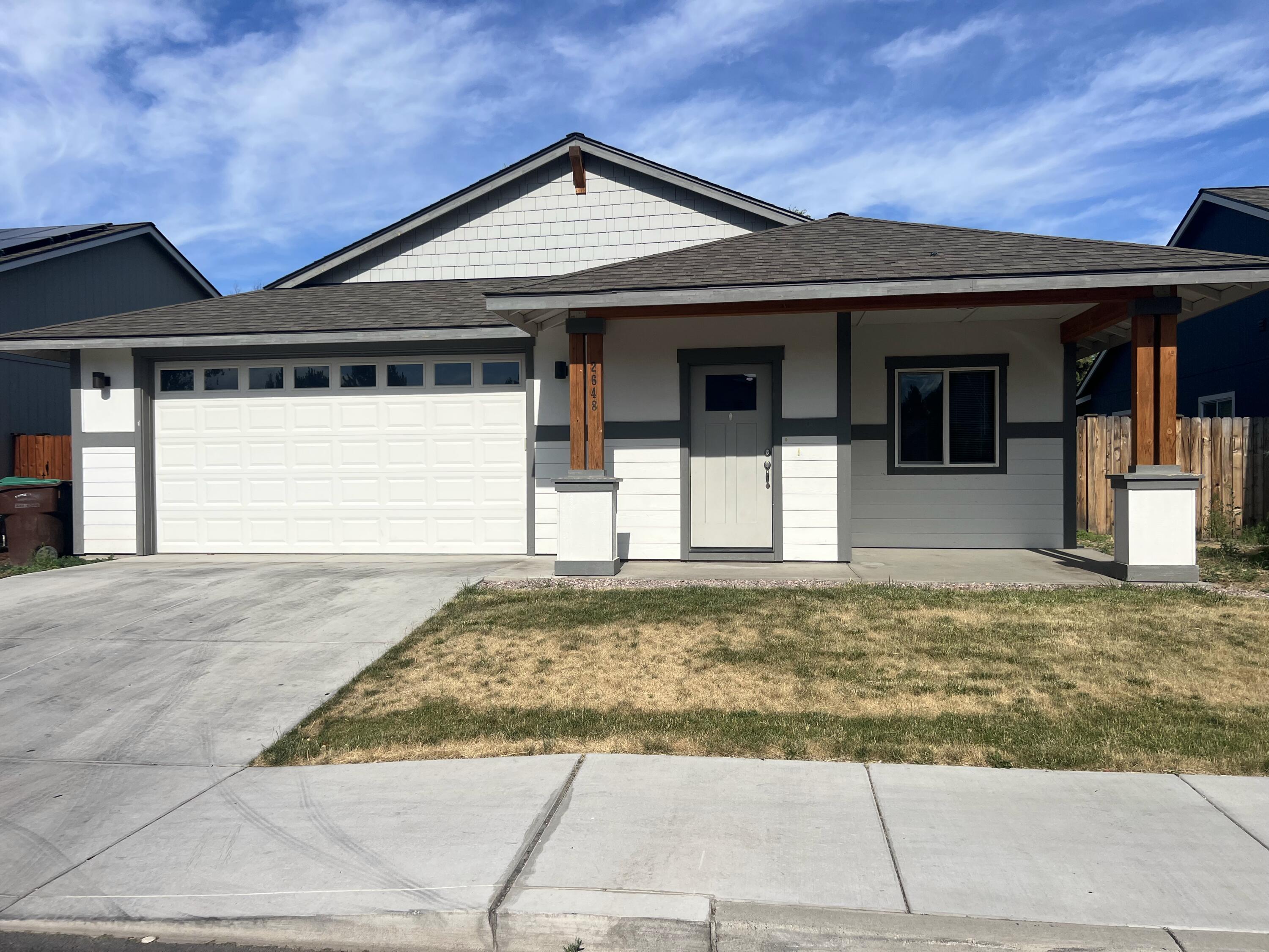 Located in  McKay Meadows subdivision in Prineville, Oregon, this 0.11-acre property offers a delightful abode for discerning homeowners. Spanning 1577 square feet, the residence boasts an optimal layout with three bedrooms and two bathrooms, providing ample space for comfortable living. Outdoor enthusiasts will enjoy the private deck/patio, ideal for dining or relaxation. The landscaped yard, has a convenient sprinkler system. Practicality is seamlessly integrated into this home, with a spacious two-car garage providing ample parking and storage. The property's ideal location close to town, makes it a prime choice for families and individuals alike.