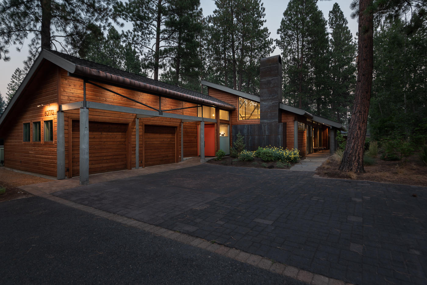 Spectacular updated single-level modern Widgi Creek golf retreat perfectly situated on the way to Mt. Bachelor with a multitude of Bend amenities within easy reach - skiing, Deschutes River, hiking, biking & Good Dog Park. The community features an award-winning golf course & 10 court indoor pickleball center. Upon entering this home, you are captivated by the open floor plan featuring a climate-controlled glass and steel wine cabinet, custom fireplace and a wall of windows capturing the beautiful golf course view. The kitchen has a Wolf range, commercial hood, 2 Miele dishwashers, wide combo refrigerator/freezer and a stainless-steel kitchen island perfect for entertaining. The master bath is a spa retreat with walk-in shower, free standing tub, quartz countertop, dual sinks & lighted mirrors. Outdoors includes a fenced paver patio with a custom kitchen constructed of steel with cement countertops. A side patio with golf course views has a water fountain perfect for bird watching.