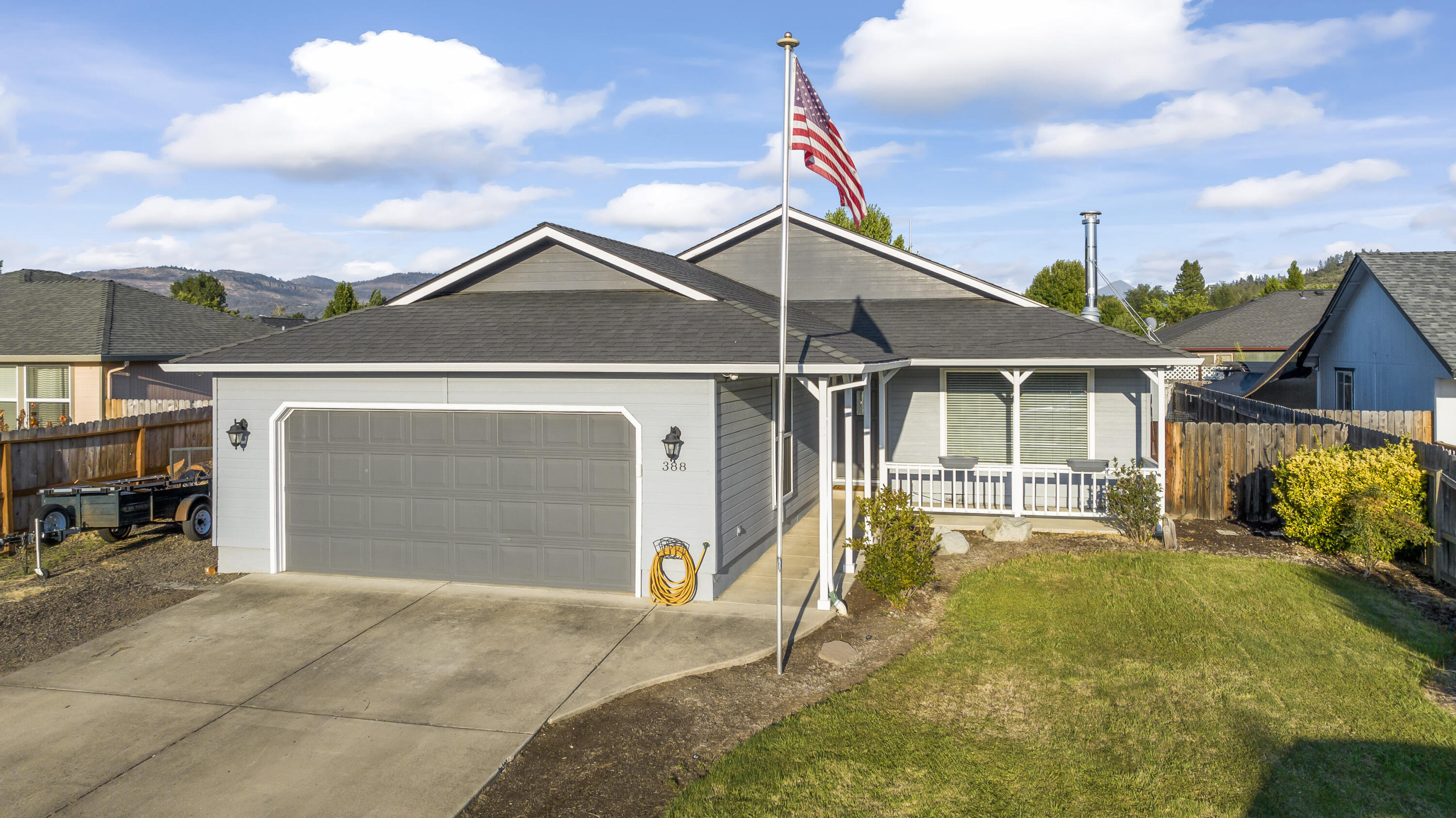 Nice maintained and upgraded home in Eagle Point near golf courses and Oregon adventure! This home has vaulted ceilings, newer central heat and air, brand new wood stove, country porch, fence in back yard with shed and storage and rv, boat or extra parking in Eagle Points beautiful neighborhoods.  Enjoy backyard covered patio and move in! This one won't last long so tour today!