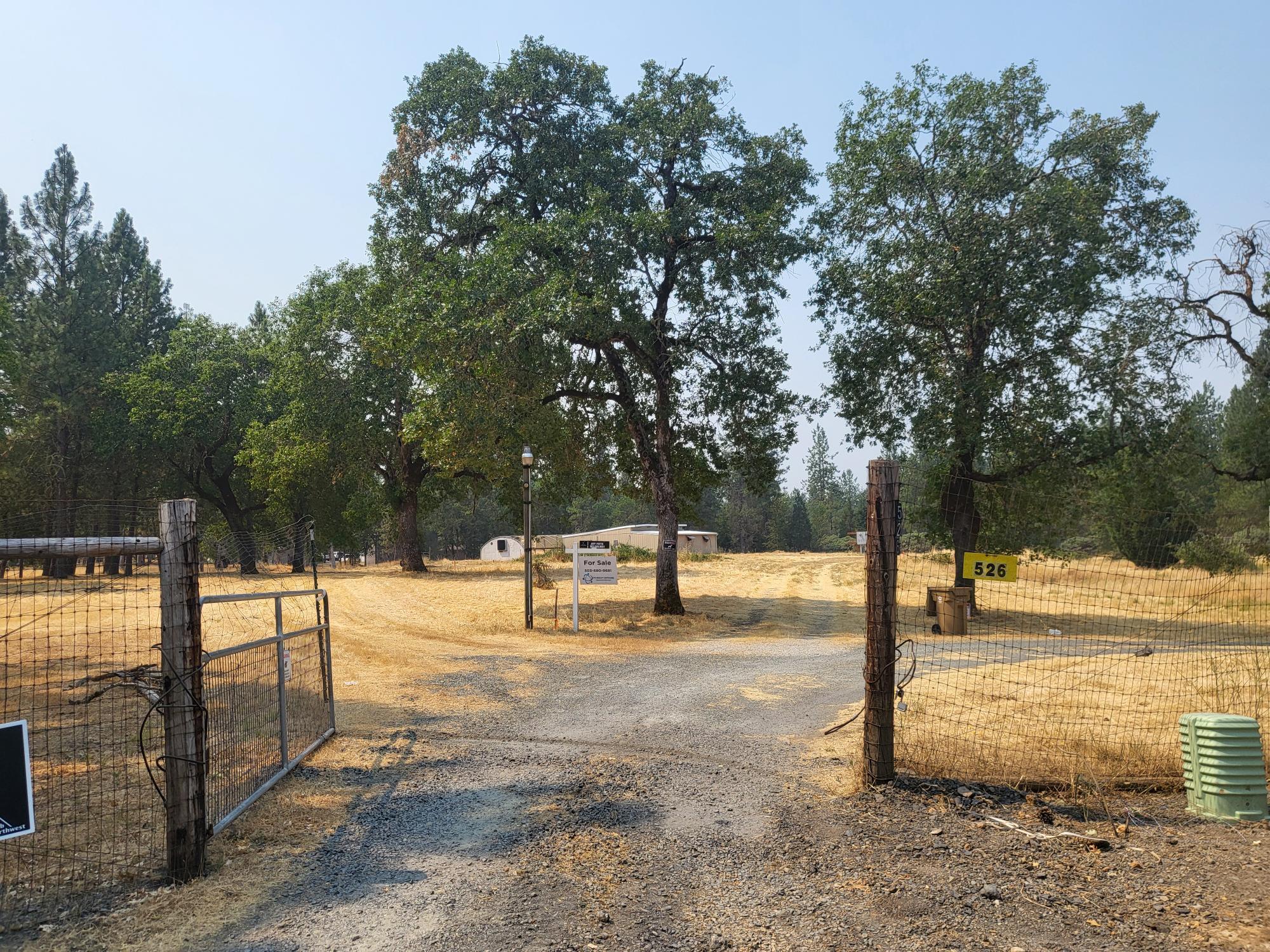 Ready for your Builder or Manufactured Home.  This is one of the last buildable lots in the Hartsfield area......2.5 Acres with a 35 GPM Well, Septic Approval and 400 AMPs on site. Approximately 1/2 of the property fenced and gated. Finished Shop, insulated and sheet rock, with power and AC. The seasonal creek is running right low right now, and is usually dry in the summer. Ready for your RV or New Home Construction. Driveway is deeded access from the culdesac. Listing Broker is related to Seller.