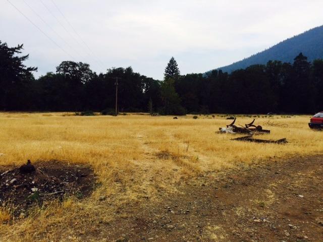 Open pasture land. Good sun. South facing. 9.25 acres in two legal parcels. Zoning Exclusive Farm Use. 1700 sq foot storage building. Power pole on property. Water is pond area in field which is underground fed. Flow test done on pond in Sept 2015 shows 18 GPM. End of road. Property is fenced. Located in Selma. Owner will carry with 50% down. Buyer advised to due their due diligence for their intended uses.