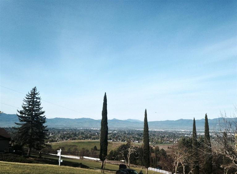 Enjoy the sunset over the valley, from this 1+ acre view'' homesite! Convenient Medford location and fabulous valley and Table Rock'' views from this gently sloping homesite. RR zoning, septic approval, well, paved drive, security gated and irrigation from MID. North Medford High school, Abraham Lincoln Elementary and a wonderful rural neighborhood.