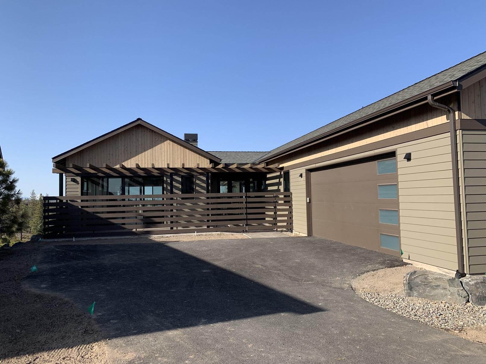 Entered for comp purposes. Single-level Rimrock plan with 3 bedrooms, a den/office, and an oversized 2-car garage. Luxury finishes and craftsmanship throughout include hardwood floors in the main living areas, quartz countertops in the kitchen and bathrooms, and tiled showers and floors in the bathrooms. The walkout deck off the back of the home overlooks the Deschutes National Forest with Cascade Mtn and golf course view. Direct access to Phil's Trail system for mountain biking and hiking is just out your back door and the community is across from the Tetherow pool, fitness center, dining, and golf course.