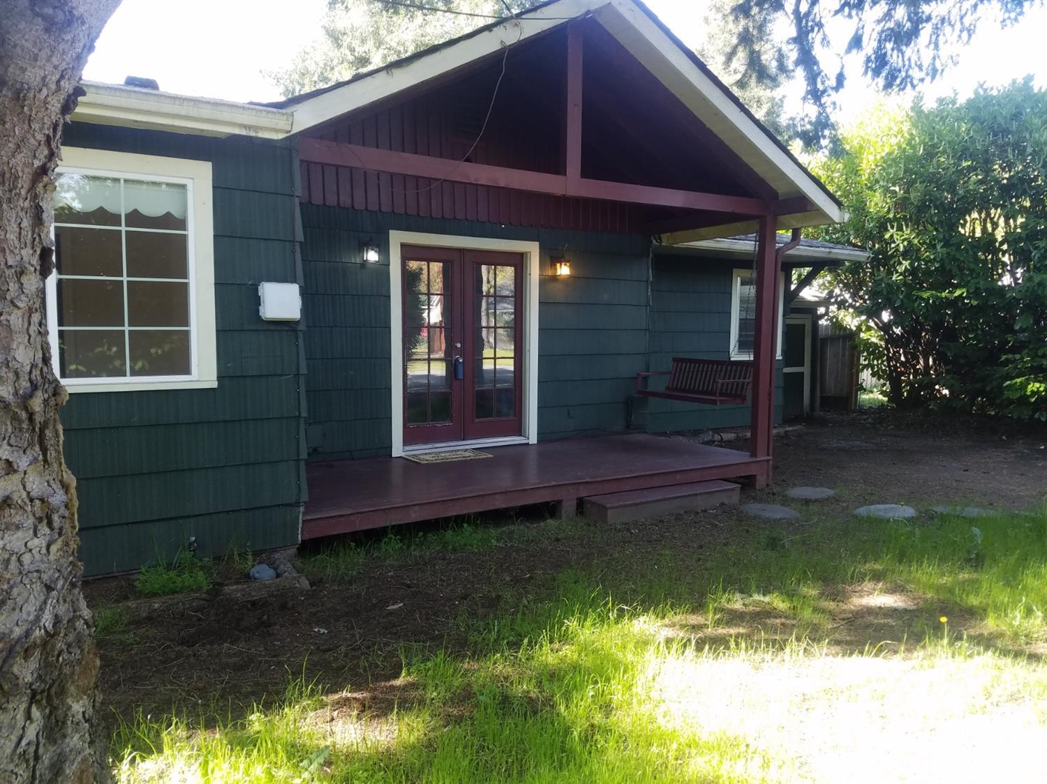 Seller says time to go!.. Huge reduction... bring all offers...Seclusion so close to town! 2 large master bedrooms, 2 baths, 3rd small room for office nursery, exercise, or 3rd bedroom on large .21 of an acre corner lot with tall privacy hedges all the way around the property. Big back yard and glass green house included. Split floor plan, Hard wood floors throughout, some newer windows, upgrades from remodel, French doors, ceiling fans, nice counter tops, dishwasher, granite and glass shower in bath, attached bonus vault or man cave room, mini split A/C system, close to everything, one of the best values out there, a must see... come take a look today.