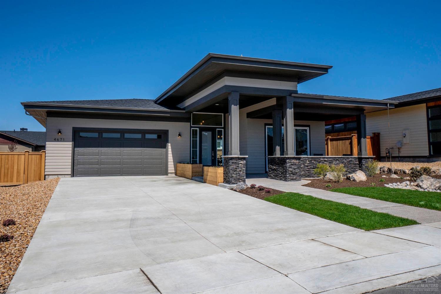 Large open spaces in a modern design are inviting in this home by Palmer Homes in Redtail Ridge. Vaulted ceilings, bright spaces, luxurious master suite and inspired family living areas with mountain views, 3 car garage, all on a large home site.