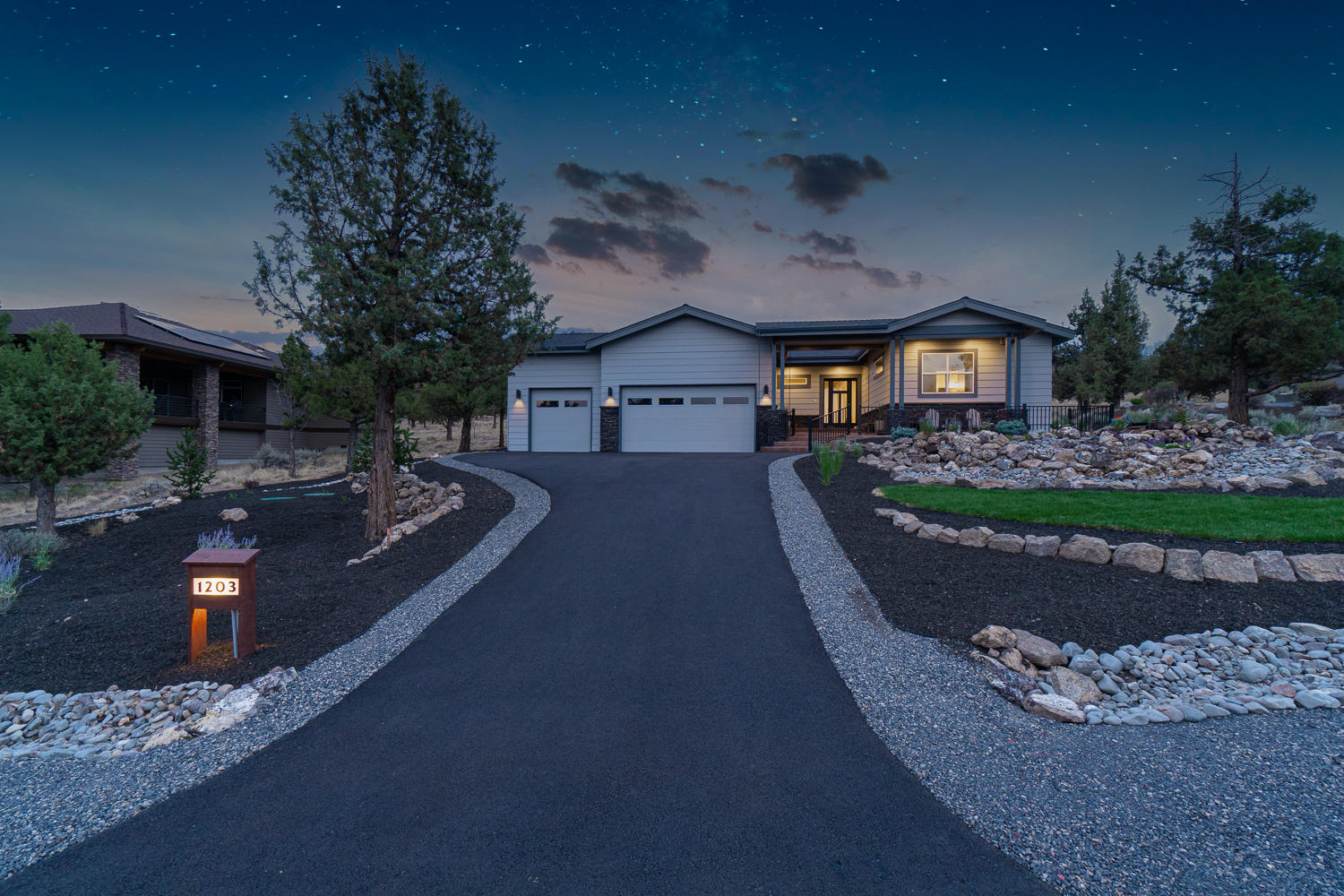 Stunning Northwest Contemporary with coastal accents in Eagle Crest Resort! This gorgeous home was thoughtfully designed and exceptionally crafted with attention to every detail. The great room features a soaring shiplap ceiling, wide-plank European Oak engineered hardwood floors, and floor to ceiling stacked stone gas fireplace with backlighting. Entertainer's dream kitchen with a large island, solid quartz countertops, KitchenAid five-burner gas cooktop, double oven/convection microwave, and huge walk-in pantry with outlets. Primary suite with His and Hers vanities and closets, walk-in, two-person shower with dual shower heads, motion sensor toe-kick lighting, and heated floors. Guest en-suite with walk-in shower, large walk-in closet, and heated floors. Office with double glass doors, and closet for storage. Large utility with sink, built-in cabinetry, and storage closet. Expansive covered stamped concrete patio in back and tiered courtyard in front. Triple car garage.