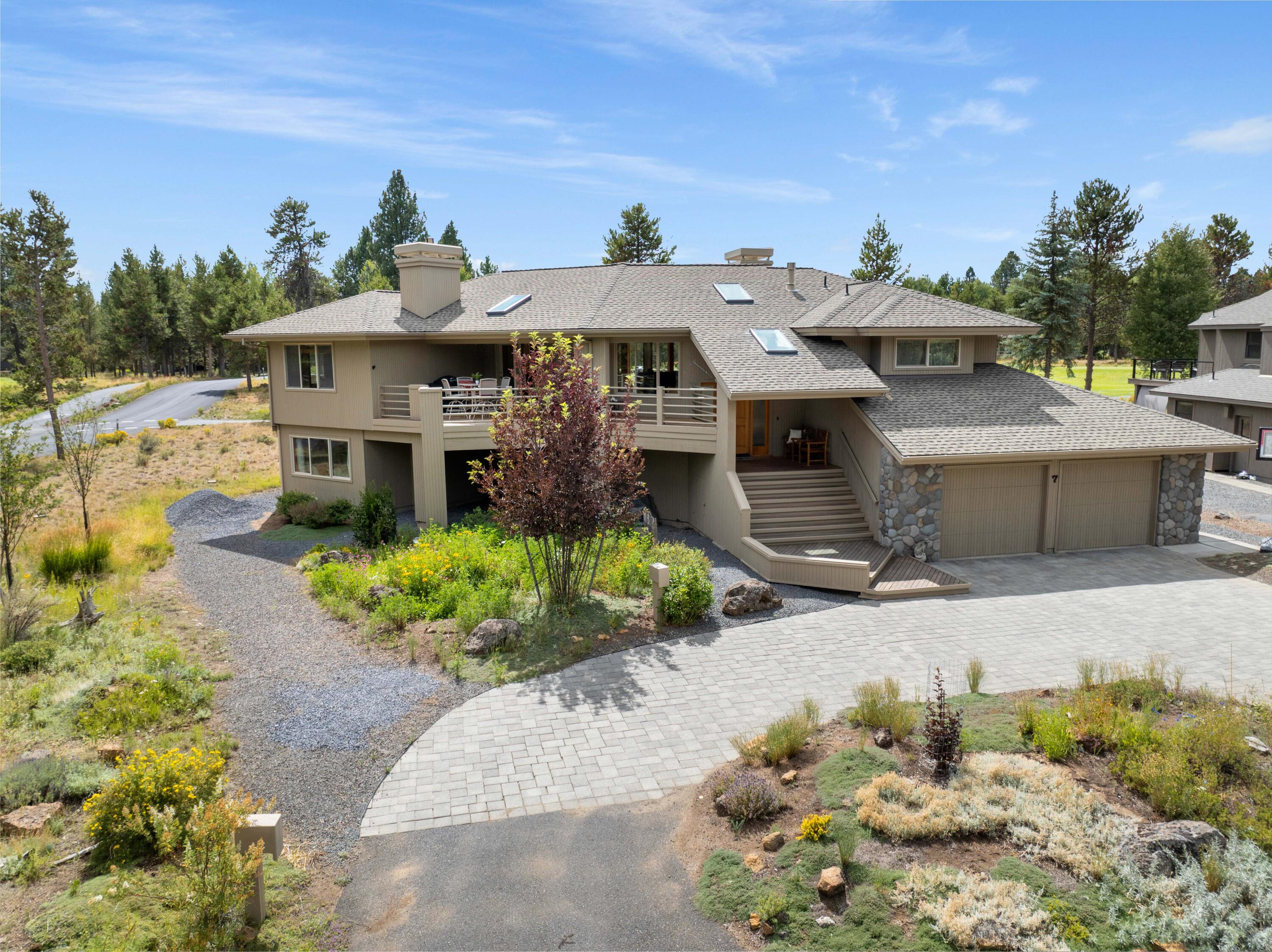 Featuring unrivaled views of the 3rd & 4th fairways of the Woodlands Golf Course. A prime location in the coveted north end of Sunriver! Natural light fills the kitchen & upstairs living areas.  The vaulted ceilings, exposed beams, wood-wrapped windows, hardwood floors, & tile accents are an architect's dream w/ extra attention to detail. Three decks, one of which is wrapped around, face south, east, and west, providing all day light & lots of choices. The spacious floor plan includes a main-level main suite, & on the lower level 2 bdrms, family room & bonus room. The kitchen features generous counter space, abundant cabinetry, & a walk-in pantry which flows into a family room w/ a fireplace. Extras include 2 fireplaces, a circular paver driveway, tons of storage, flex area, an oversized 2-car garage that can easily convert back to a 3-car tandem, closets engineered for a future elevator, newer roof & A/C.  Enjoy your private hot tub & exquisite landscaping!
