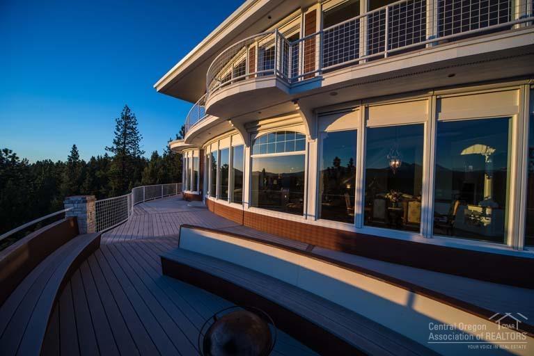 Magnificence Cascade Mountain Views & Pure Elegance located in Sisters, on one of the finest view setting in Central Oregon. Designed so all living spaces, including 2 full great rooms, dining areas, gourmet kitchen, all master suites, old world office & the expansive decks all enjoy an unobstructed panoramic view of the Cascade Mt Range, floor to ceiling windows on all three levels, elevator, Carriage-House, 1 br. apartment, indoor pool, 6 car garage, energy efficient. Sold Furnished.