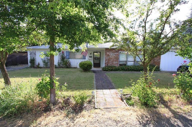Excellent opportunity for the buyer or investor wanting a 5 bedroom 3 bath home in East Medford! The lg master suite was a garage conversion w/ bathroom & separate entrance. Lg kitchen w/ utility room. Dining room w/ wood burning fireplace, living room w/ woodstove insert, hardwood floors & enclosed sunroom is included in sqft. Lg corner lot w/ 2 outdoor sheds. RV parking. High efficiency HVAC system. Great property w/ room for large family, previously was used as an adult foster home, room for a garden and so much more.