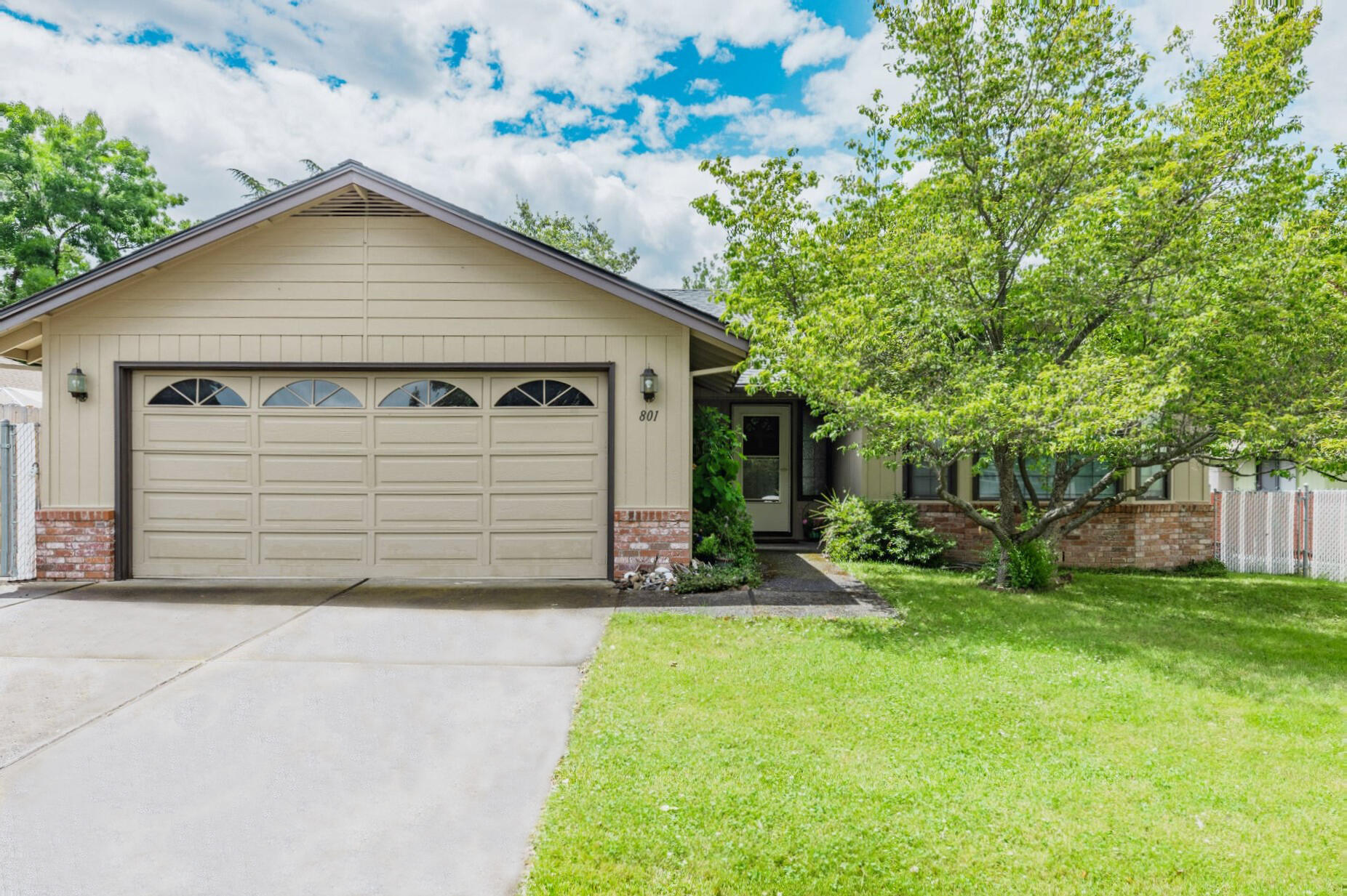 Great neighborhood & location for this single level well designed home. The floor plan is fantastic! The hardwood entry leads to the spacious & stylish vaulted living room with beautiful, brick fireplace & large bay window.  A spacious great room features a stunning remodeled chef's kitchen with gorgeous quartz counters, black granite sink, an abundance of counter space & cabinets, a dining bar that seats 6 & stainless appliances is the heart of the home. The great room provides wonderful space for family activities & entertaining and has access to the fenced rear yard for barbeques, gardening & playing. All sleeping quarters are set well away from the main living spaces. Primary suite has walk-in closet, bathroom with dual sinks & tile counters. Additional 2 bedrooms & tiled bath. Carpeting is 5 years new, roof new in 2014. HVAC is 1 ½ years new. Lots of storage, 2 car attached garage, extensive RV parking with full hookups, shed. Immaculate!