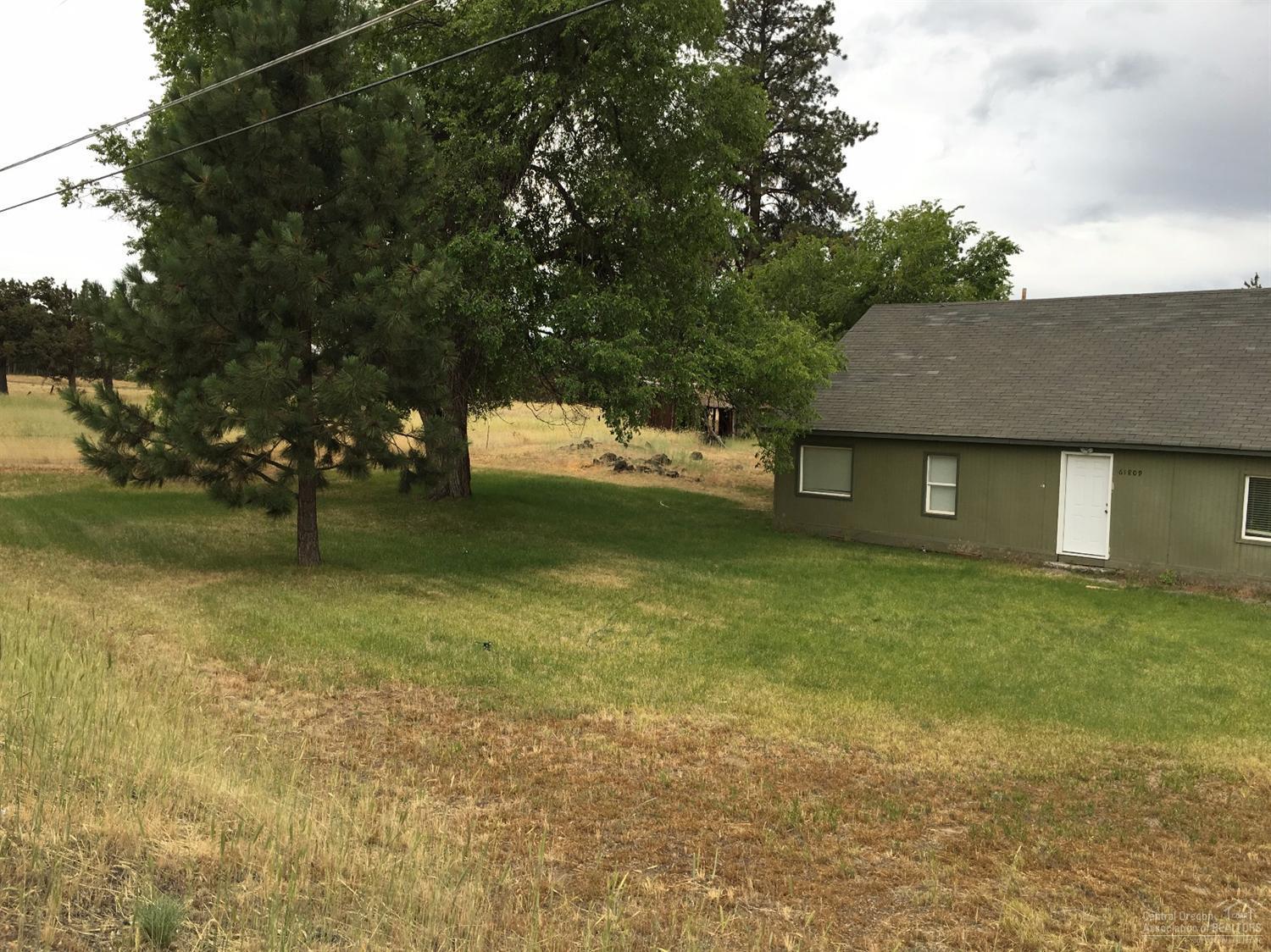 ATTENTION Investors & Developers! Here is a perfect 1.4 acre parcel on 27th in between all of the new subdivisions popping up. Property is ready for development. Don't hesitate on this perfect opportunity to develop this parcel. Property has been a consistent rental for 15 years. ADJOINING PROPERTY TO THE WEST IS AVAILABLE AND WILLING TO DO A PACKAGE DEAL. Don't miss it.