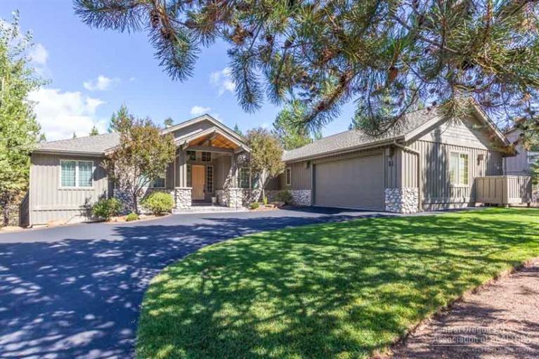 Beautiful one level residence in a quiet area of Sunriver. Soothing wood and river rock accents throughout this lovely 4 bedroom (2 suites) 3 bathroom home plus den! Soaring wood vaulted ceiling, hardwood and slate flooring, large deck with private hot tub and an oversized 2 car garage. This home is immaculate and shows the best of care!