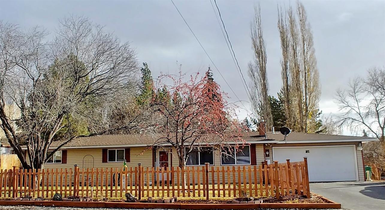 Updated single-level home with 2-car garage and RV parking. Spacious open kitchen features custom painted cabinets and new appliances. Master suite and 2 additional bedrooms make this a perfect sized home. New roof in 2015, new vinyl siding, new gas furnace, sprinkler system, new flooring and so much more. Huge backyard with new 8x12 Tough Shed, deck, fire pit and patio for outdoor entertaining. Large .29 acre lot in a great neighborhood.