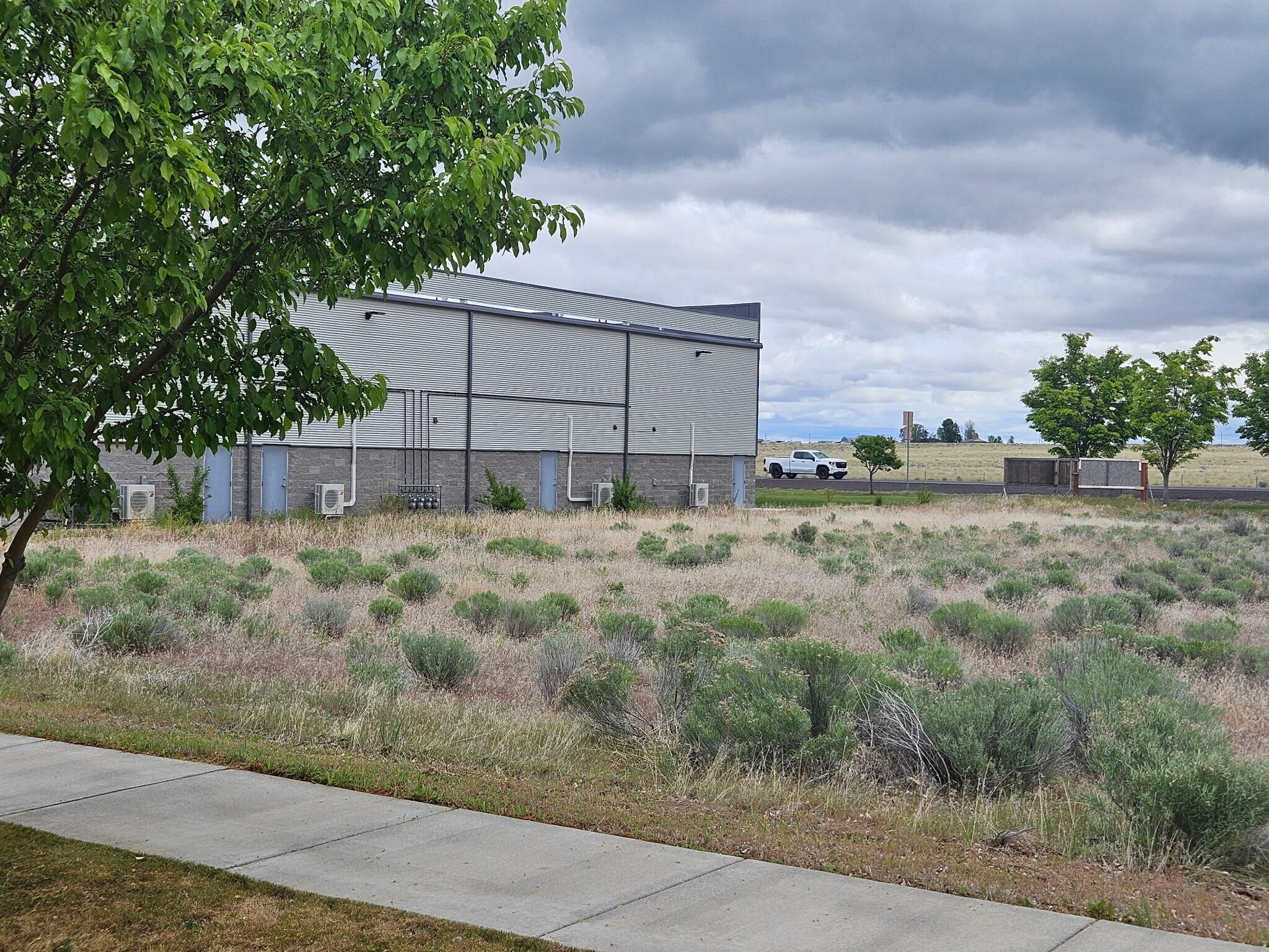 Prime 1.20 acres industrial zoned lot in Jefferson Business Park. The lot fronts Hwy 26 with access off of NW Andrews Dr. Great investment or location to place your business.