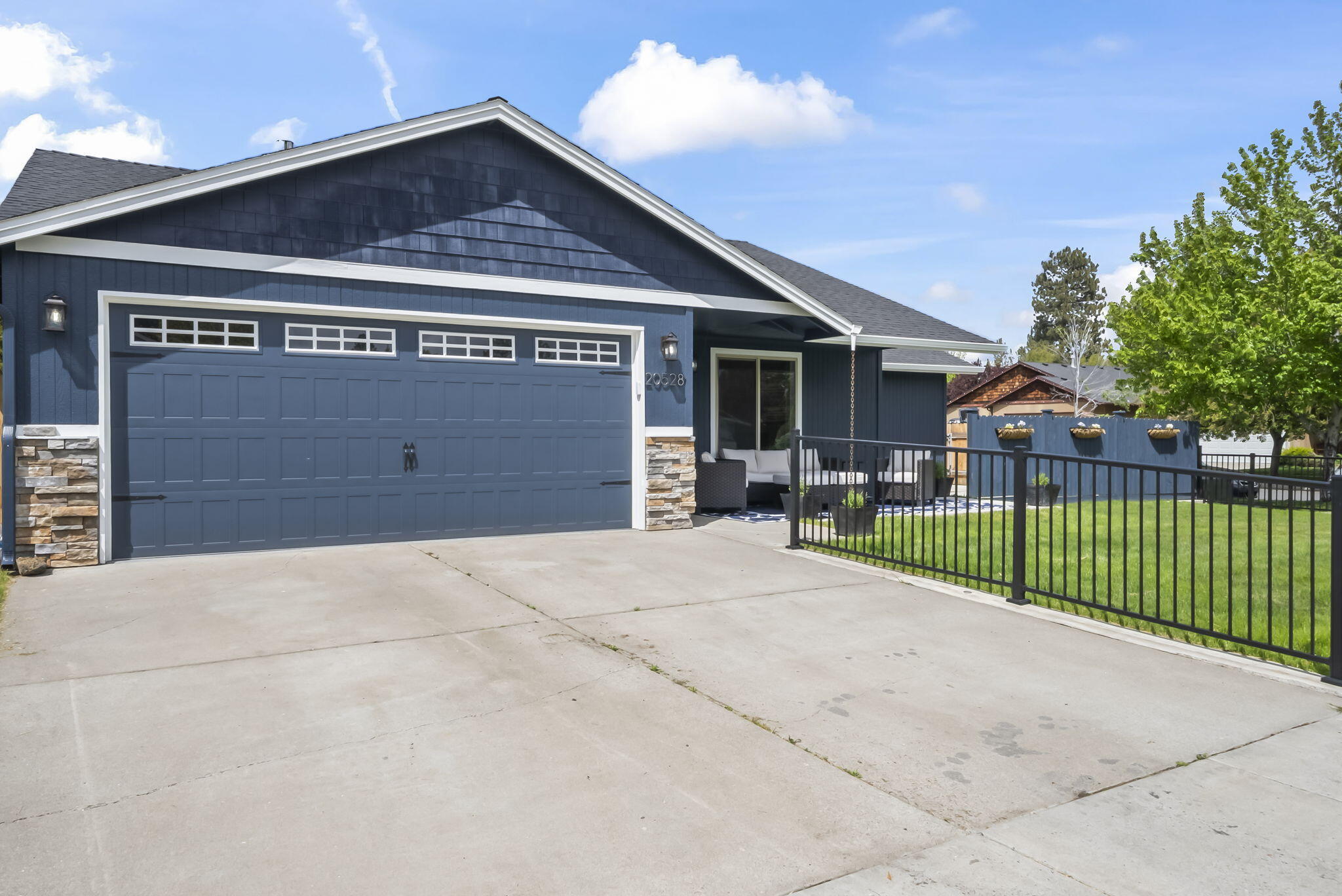 This charming single-level home has been completely remodeled from top to bottom, offering a modern feel in a quiet neighborhood. Step inside to discover an open and inviting layout with brand new flooring, fresh interior and exterior paint, and updated lighting that brightens every room. The kitchen is a true showstopper, boasting granite countertops, sleek cabinetry, stainless steel appliances, and a beautifully tiled backsplash—all thoughtfully designed by the seller to blend style and functionality. The bathrooms have been entirely transformed with new vanities, contemporary fixtures, and stunning LED-illuminated mirrors that add a touch of luxury. Every detail has been carefully considered, from the new doors and hardware to the clean, cohesive finishes throughout the home. The covered front porch invites quiet mornings or evening relaxation, and RV parking offers convenience with its turnkey condition, thoughtful upgrades, and serene setting. This home is truly move-in ready.