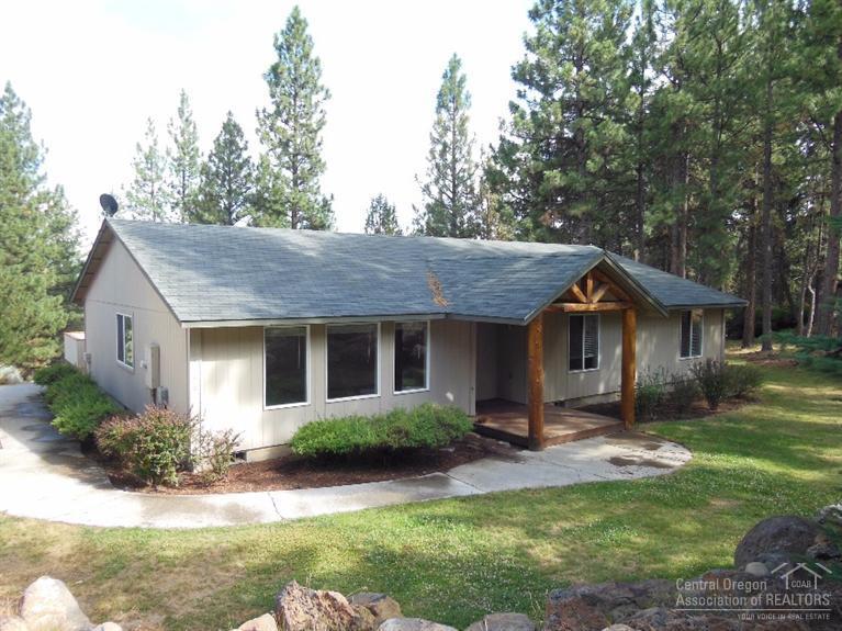 Discover this special setting in the pines w/sunny southern exposure and a wonderful amount of privacy. Well kept and clean 4 bdrm, 2 bath 1920 sq. ft. single level home w/large patio and detached 864 sq. ft. triple garage/shop. Easy landscaping. Located in Indian Ford Ranch, the one acre sloping lot offers a mountain feel with views into forested open space. Pine Glen is a wonderful neighborhood just minutes from Sisters.
