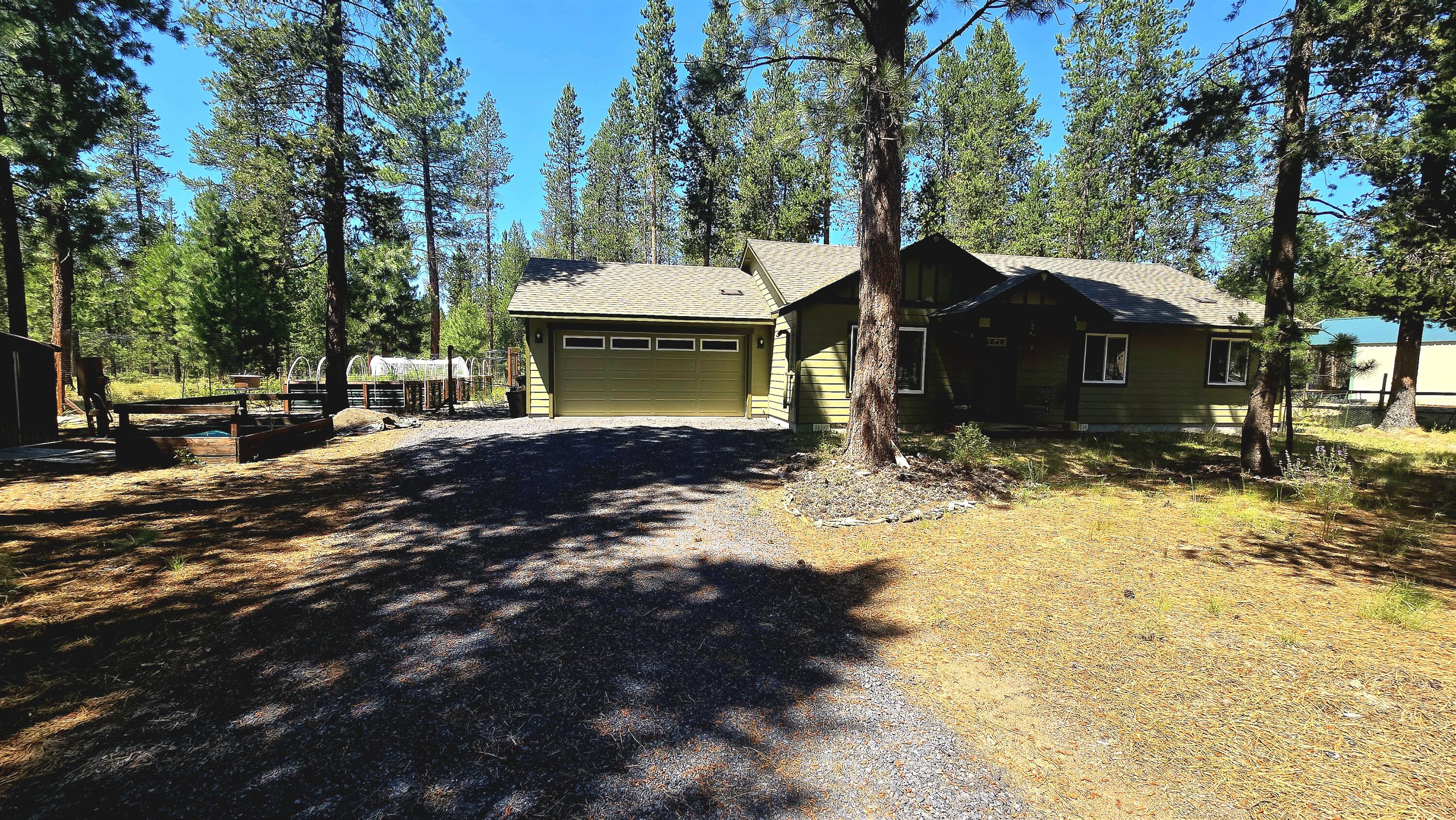 Located in Wagon Trail Ranch, this beautiful 3-bedroom, 2-bath home sits on nearly an acre. Thoughtfully designed, kitchen with island features solid surface countertops and with surprisingly a lot of storage, making it perfect for both everyday meals and entertaining guests.

Step outside and immerse yourself in nature, whether soaking in the small hot tub under the stars or tending to the raised garden beds with drip irrigation. The fully fenced garden area keeps the deer at bay, ensuring your plants thrive. Yet allows you to watch them as they travel the neighborhood. 

Inside, comfort is key. Stay cool in summer with a mini-split AC, and enjoy cozy winter nights by the efficient pellet stove. The attached garage adds convenience.

Wagon Trail Ranch community enhances your lifestyle with access to a pool, picnic area, and the tranquil Little Deschutes River. This property offers the perfect blend of rural serenity and modern convenience—schedule a showing today!