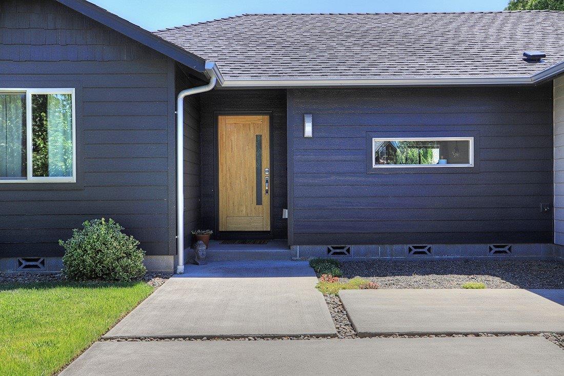 Looking for an affordable custom home? This is it!! Comfortable split bedroom floor plan with 3 bedrooms, 2 full baths all situated is 1428 square feet. The open Great room has vaulted ceilings, sliding glass door to the back yard and kitchen with breakfast bar, pantry, range/oven, dishwasher and microwave. Master bedroom has a large walk-in closet with en suite bath with double sinks and shower. This modern home has a contemporary kitchen with energy saving lighting and beautiful floors and fixtures throughout. There is a nice sized laundry room right off the garage. Featuring a sizable fenced backyard with t raised garden beds. Close to town, shopping, medical facilities and easy access to I-5 . Anyone considering the purchase of this property should perform their own investigation into the uses and conditions of the property.