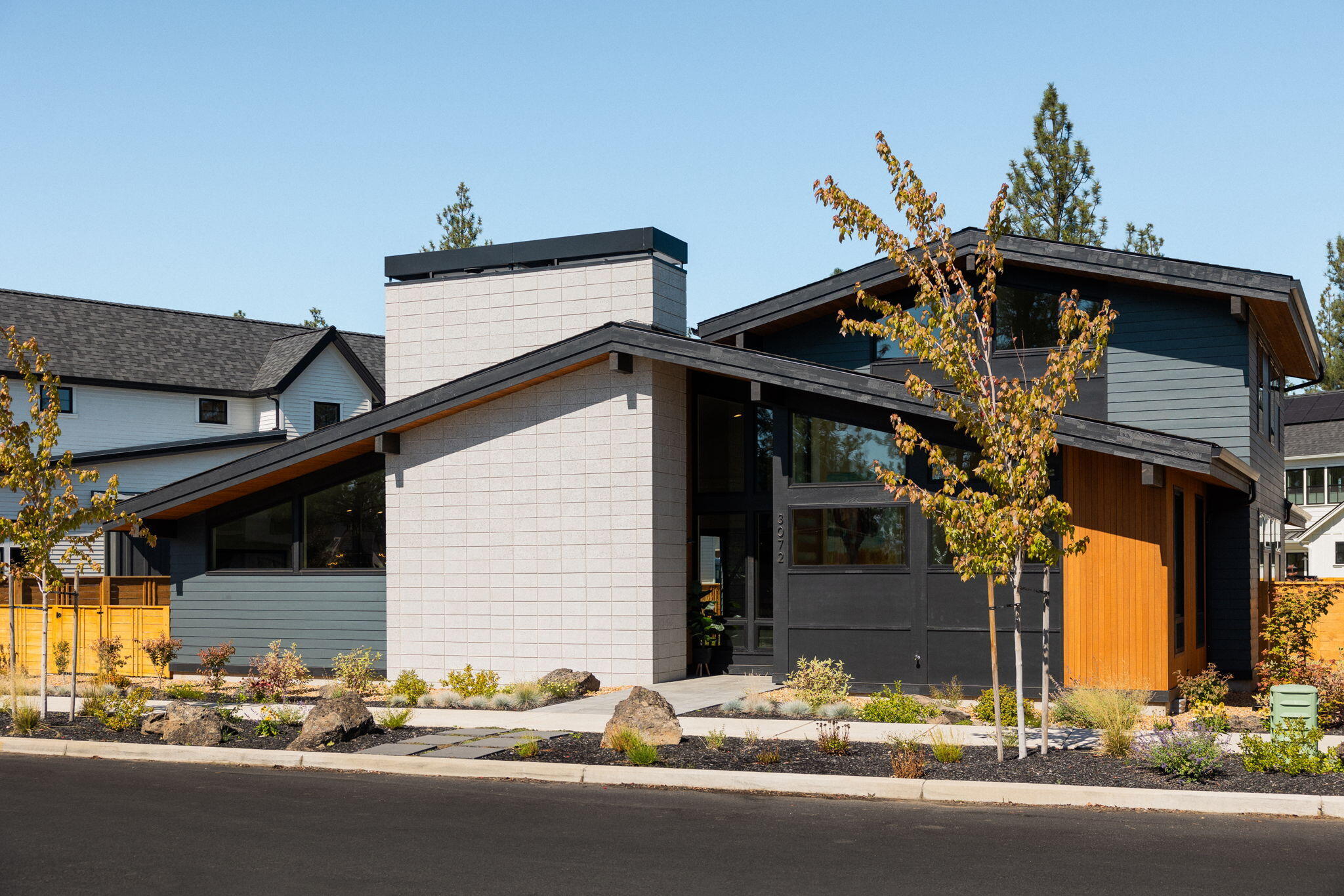 Modern design + uncompromising craftsmanship come together to create your dream home in Discovery West! Upon entry, you'll notice the stunning natural light + white oak hardwood floors that create a captivating ambiance throughout. On the main floor you'll find the ideal + open floor plan including the kitchen, dining + great room, along with the primary suite, true office + powder room. The kitchen features cafe appliances, an oversized 48-inch built in fridge, quartz countertops+a waterfall island with stunning oak accents. Enjoy the perfectly cohesive indoor+outdoor living areas that are ideal for entertaining all year long. The mudroom with ample storage leads into the 3 car garage w/ a bay for your sprinter! Upstairs you'll find 2 other rooms, a bright+beautiful bathroom, 2nd story balcony+loft perfect for an additional office or yoga + meditation room. This location is truly unmatched, w/access to some of Central Oregon's best trails, restaurants + more