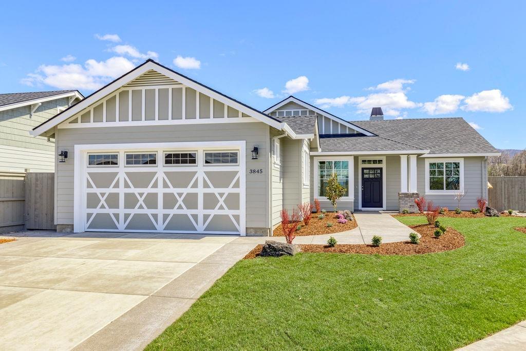 Built in 2020 in a beautiful country setting in East Medford area with views of surrounding mountains nearby! An exceptional quality builder that we've grown to love in the valley throughout the years is what you get when you purchase a home built by Pacific Trend Building Company. A stunning craftsman styled home with approximately 1765 sq ft, 3 bedrooms, 2 full baths. Open kitchen with leathered granite counters and tile backsplash. Including high end light fixtures, beautiful brick fireplace and white box beams in the living room. Custom cabinets are birch and alder with the highest quality in the industry. Master bedroom features a subway tile shower. Carpet throughout bedrooms. Bathrooms and laundry include tile flooring. Professional landscaping in front and back and spacious RV parking round out this home. Estimated completion date April 2020. Other lot and home packages available! Listing agent is related to seller. Pictures are for illustration purposes only.