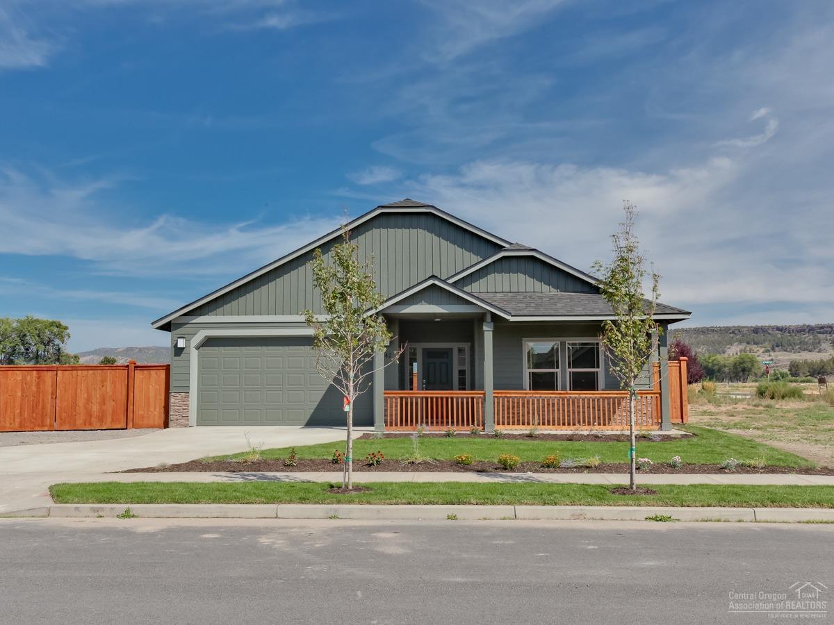 Wow! New construction. Single level home w/1749 sq ft has an open living great room that opens to a large kitchen w/an abundance of cabinets & huge island w/eating bar. Knotty Alder cabinets w/Quartz counter tops. Master w/box ceilings, large walk in shower, double vanities & walk in closet. Separate utility room w/counter. 2 more beds to top it off. Includes A/C w/forced air gas furnace. Has Fireplace. Landscape w/sprinklers. Fenced. Parking is graveled & fenced. Attached double car garage is 26 ft deep. Vacant!