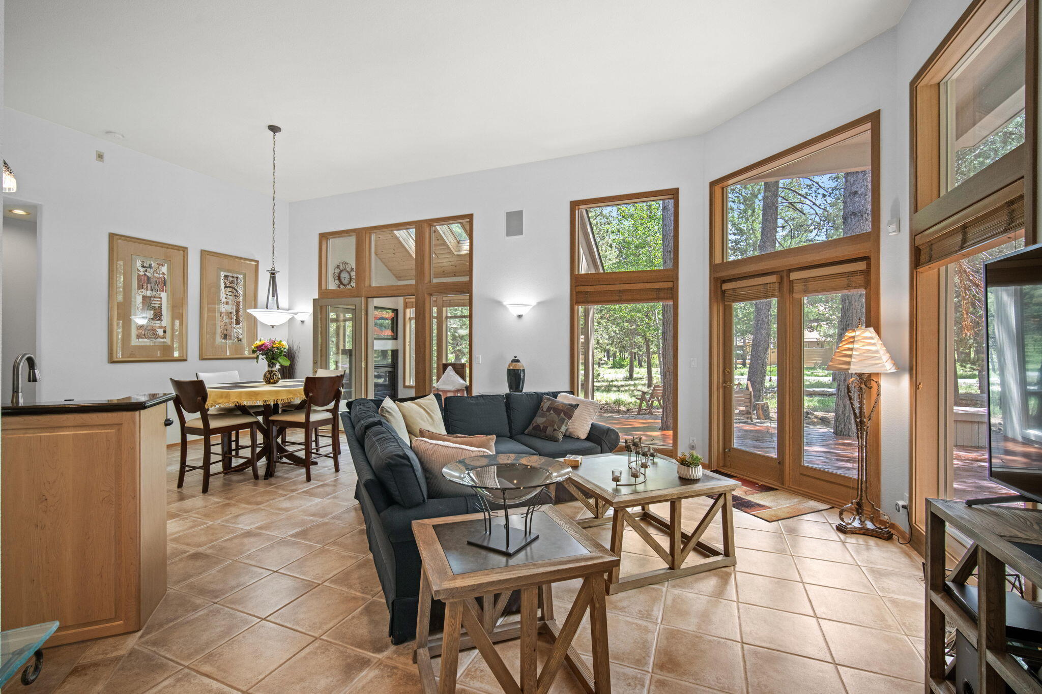 1 Mt Baker Lane is located on a corner lot in beautiful Sunriver, this quality-built, lightly used single-level home by Sun Forest Construction offers comfort, space, and functionality.
This 3-bedroom, 2.5-bath home features a spacious open floor plan with 12-foot ceilings, two living areas, two gas fireplaces, and a light-filled sunroom. The kitchen is well-appointed with granite countertops, dual sinks, and ample workspace—perfect for cooking and entertaining.
Enjoy three separate outdoor living areas, including a newly refinished deck that backs to common space with trails right out your door. Interior features include Hunter Douglas blinds, abundant natural light, and thoughtful separation of living and bedroom spaces.
Additional highlights include 3-car garage with room for all your outdoor gear, heated gutters for winter ease.  Driveway was just refinished 8/31. This home has never been used as a rental, perfect for a full-time residence, vacation getaway, or investment