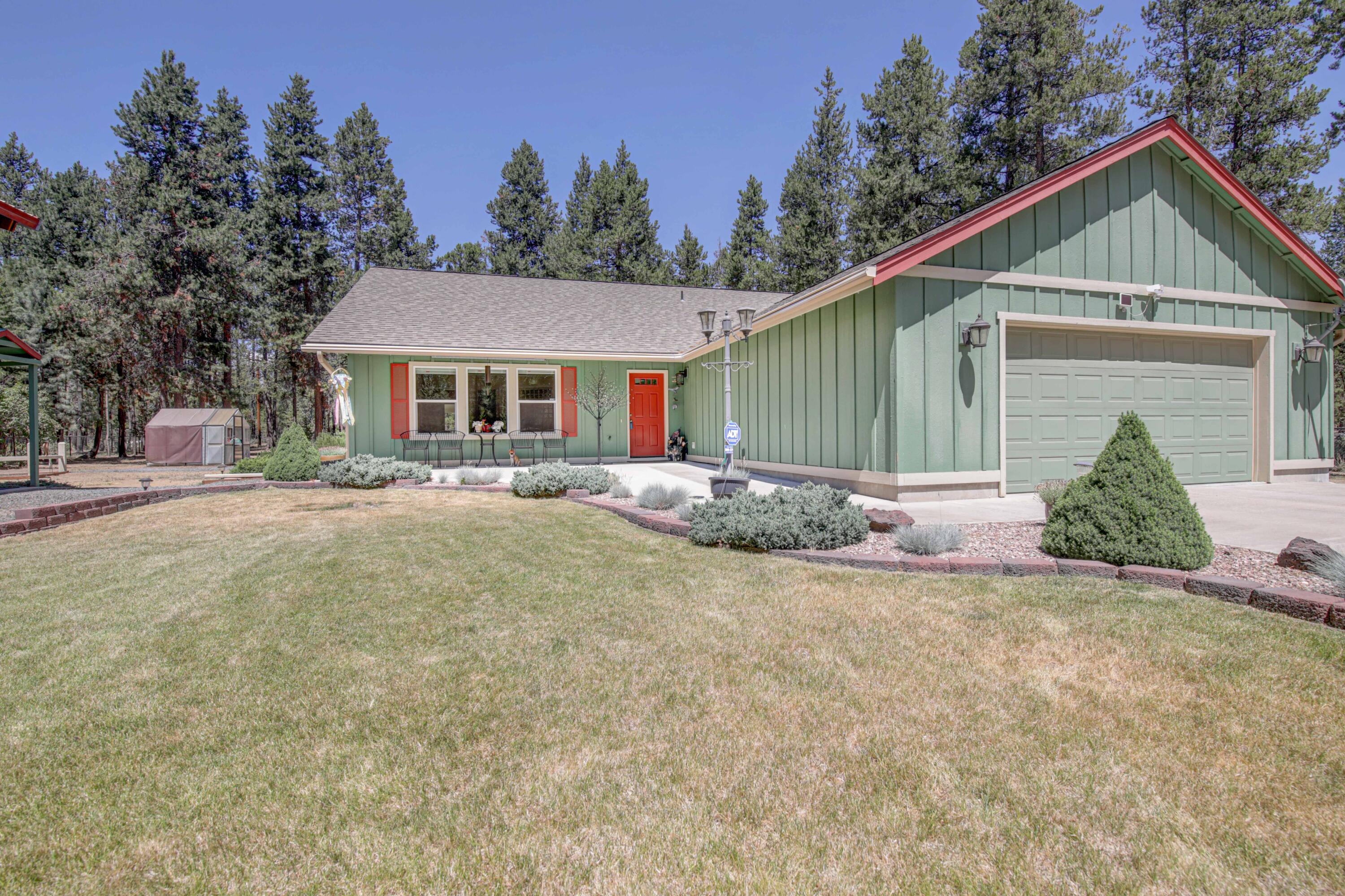 Quiet, peaceful, and meticulously maintained, this 3 bdrm., 2 ba., 1701 sq. ft. home  sits on a perfectly landscaped and fully fenced acre just minutes from lakes, trails and all that Central Oregon Recreational Paradise has to offer.  Ski Mt. Bachelor in the winter or paddle board the Big Deschutes in the summer and then end your day relaxing at one of the many restaurants in Sunriver Village or strolling the many shops. The interior features granite kitchen countertops, stainless appliances, laminate flooring, ceiling fans throughout, A/C with humidifier, and plenty of storage.  The exterior south and west facing windows have sunshades on them and the oversized patio is covered and lighted for a year round extension of the home. The 30ft. x 36 ft. shop is finished with concrete floors, electrical and automatic RV door. Road association maintains the roads year round.