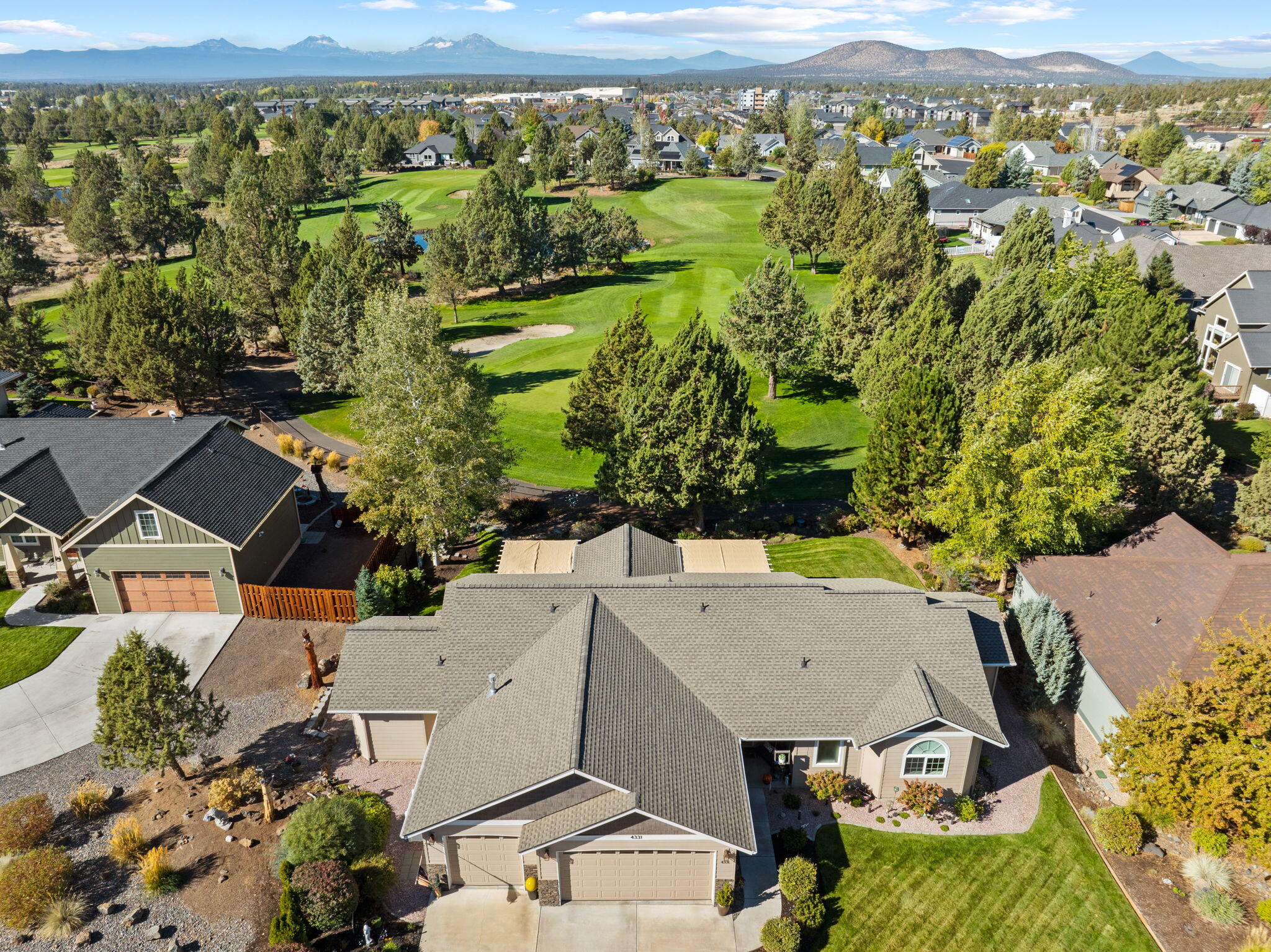 Rare find in The Greens at Redmond Golf Course, single-level, 3 BD+ bonus rm, 2.5 BTH, with stunning views of the fairway and $90k+ in upgrades! This 2,288 sqft home on .24 acre has an open kitchen, dining and living area with vaulted ceilings, gas fireplace and walls of new windows overlooking the spacious back deck, landscaped yard and fairway. The primary bedroom has a spa-like attached bath with large soaking tub, double-vanity and spacious walk-in closet. The Secondary bedroom with attached bath are on the opposite end of the house allowing for in-law living with an additional bedroom and office (or possible 4th bedroom) with views of the greens. Three-car garage with additional storage shed gives plenty of room for toys. Landscaped, garden, fenced, drip system, everything was well thought out and meticulously maintained! Easy access to Hwy 97 and the Redmond Airport. Come and see it before it's gone.