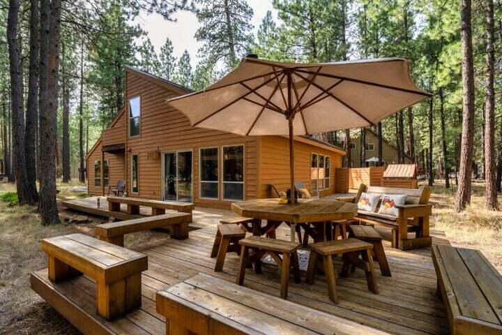 SM85 offers the Black Butte Ranch cabin charm and a floorplan designed  for this lifestyle. Walls of windows bring natural light and beauty into the great room area, dining area and kitchen. Skylights, vaulted ceilings and simulated wood flooring add to the total inviting living area. Large wrap around deck invites you to the  outdoor beauty. There are 2 main floor bedrooms and a unique jack-jill bathroom. 2nd floor loft area makes more room for fun and games or quiet times. A bedroom with a balcony is a highlight in  this area. Another fun feature is a quaint nook room with wooden bifold doors. The attached, over sized carport can cover 2 of your vehicles  and  it has a large storage area with cabinets. Heat pump and metal roof.  Big plus is the location between Glaze Meadow Rec Center and South Meadow pool and tennis court.