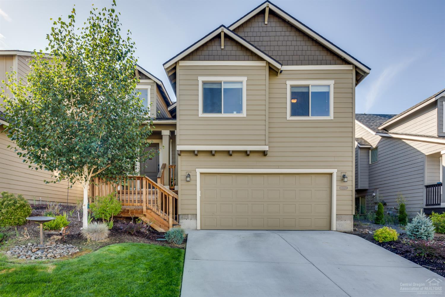 Beautiful home in desirable NE Bend neighborhood. Vaulted Great Room w/central gas burning fireplace is a fantastic place to entertain. Spacious kitchen w/plenty of counter space & storage, Stainless Steel appliances & a back yard view. Ample dining space & large sliding glass door opens to the back deck. Master Suite offers his & hers closets, double vanities & separate water closet. Two additional bedrooms on the main level along w/a full bath. Downstairs you'll enjoy a massive bonus room w/adjoining bedroom & bath that could double as a studio/multi generational living or easy room mate/rental income opportunity. Fully fenced & landscaped front & back w/auto sprinklers. The garage has been tastefully updated w/epoxy floors & additional storage. Quick access to the parkway, amenities & airport!