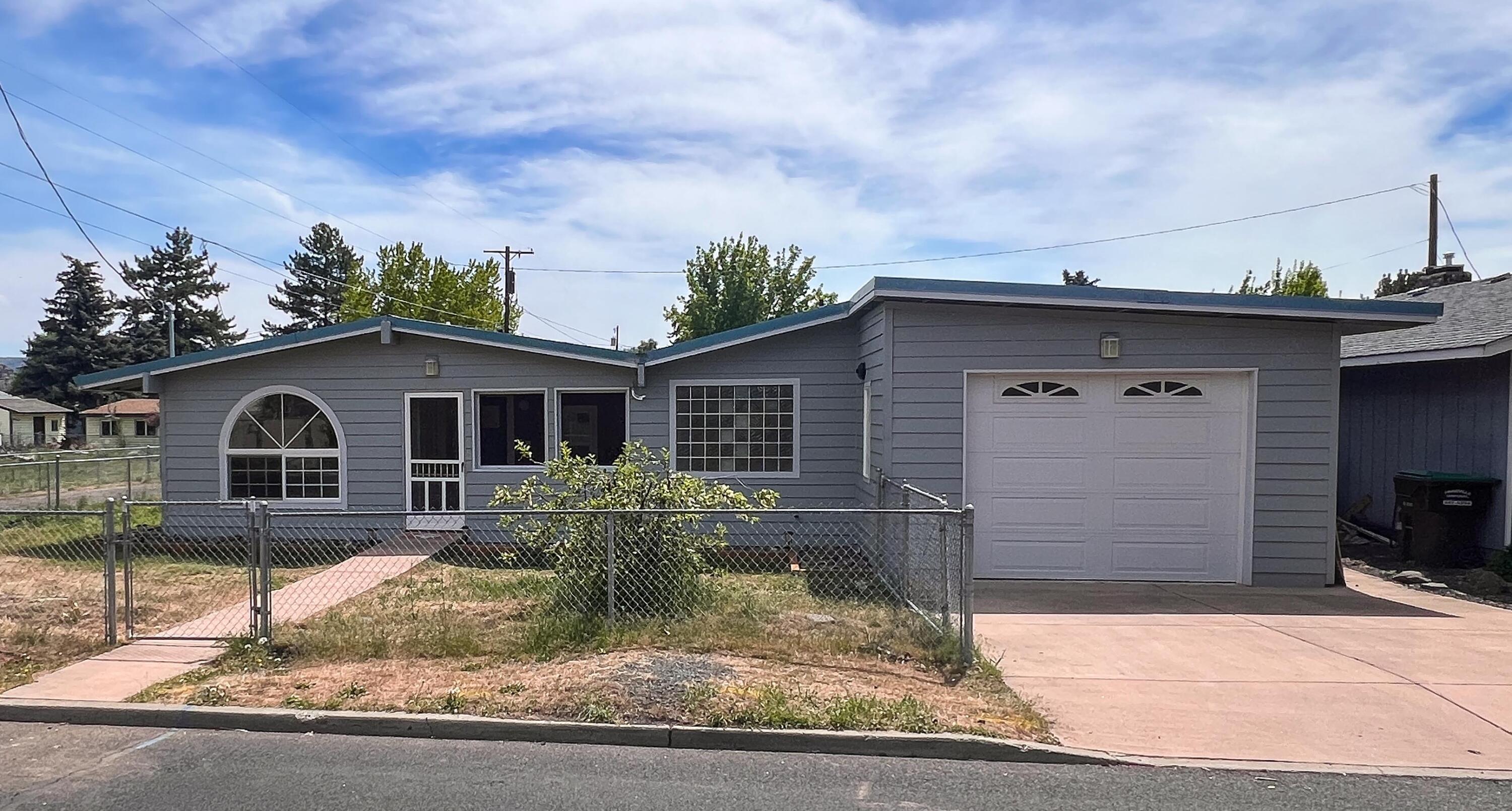 Remodeled Prineville Gem! This 4 bed, 2 bath, one level home has new interior and exterior paint, quartz countertops, stainless steel appliances, new windows, and new flooring throughout. This home features high efficiency gas furnace, attached one car garage, fully fenced yard, and separate office space in front of home as well. Near parks, schools, and restaurants. 30 min to Redmond, 45 min to Bend, 45 min to Sisters. Don't miss this opportunity!