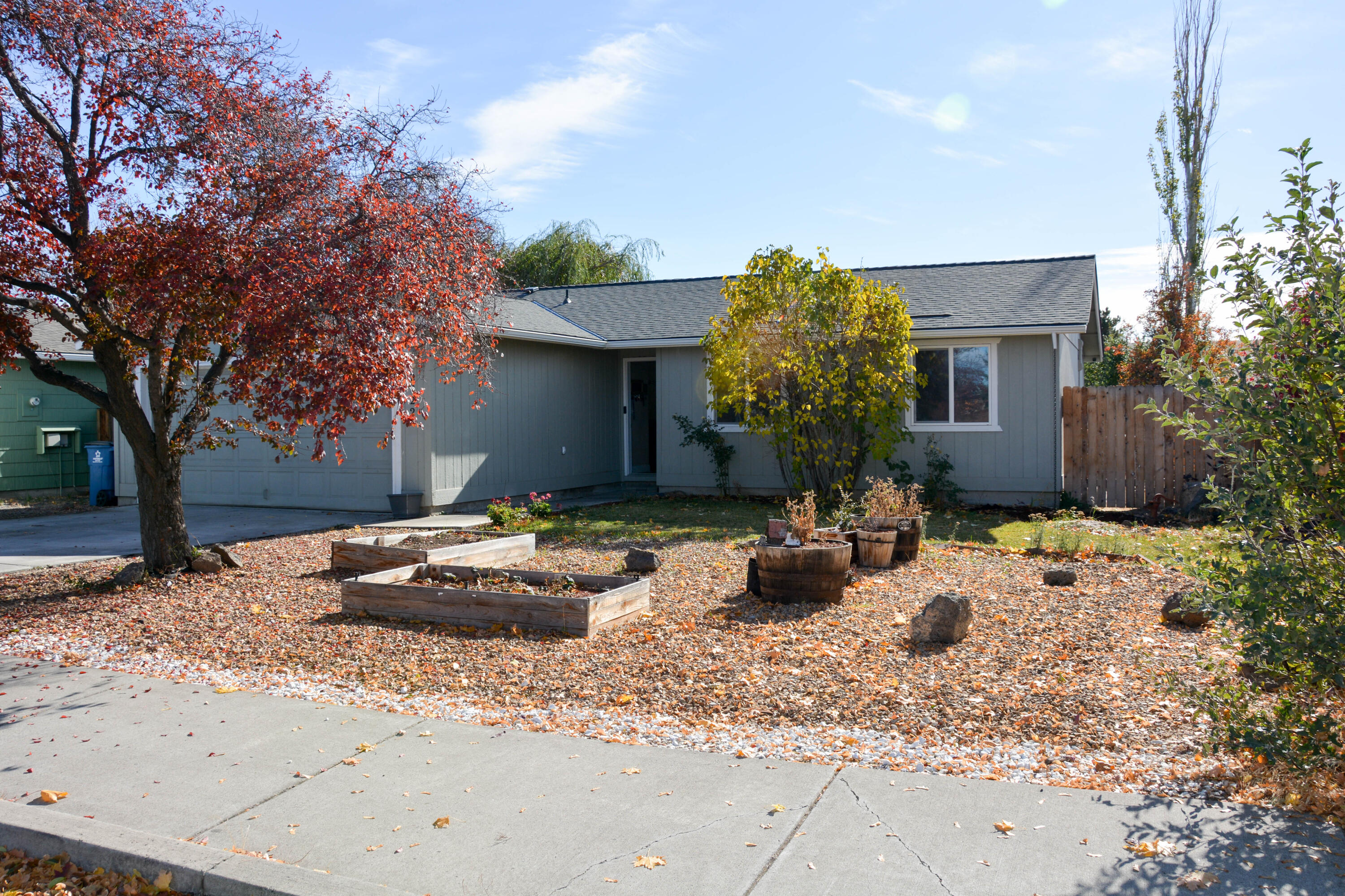 Welcome to this charming, cozy home featuring a comfortable open layout and modern updates throughout. The kitchen has been updated and open to main living area with stylish tile flooring. This home offers 3 bedrooms and 2 full baths, including a primary suite with walk in closet and private bathroom. Has a large fully fenced backyard complete with a garden area, flower boxes, and patio-ideal for relaxing or entertaining. Located in a quiet established neighborhood, this home is conveniently close to shopping, parks, schools and restaurants. Don't miss the chance to make this your home.