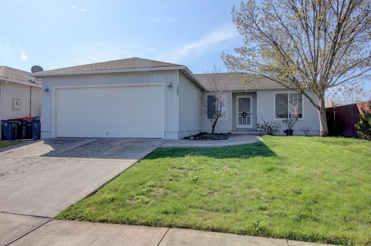 Spectacular Home in Fabulous East Medford Cul-De-Sac Location! Extremely close to town and shopping, yet nestled on a very private road with very little traffic. The home shows absolutely perfect in every way and has been extremely well cared-for. The back patio (with high end'' electric awning) allows you to enjoy the private back yard. This home has a great floor plan, all single level, tile entry way leads into a nice sized living room w/vaulted ceilings plus ceiling fan and plant shelves. Indoor laundry room w/ample shelving. Nice sized master w/ two closets and a walk-in shower. Close to town, yet private w/beautifully landscaped front and back yards with timed sprinklers, lots of mature trees, plus much more. Wonderful starter home in a fantastic area. Must tour!