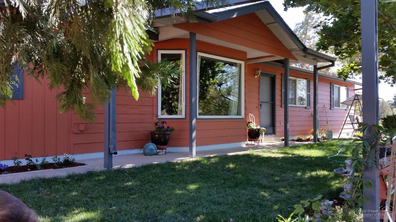 Come enjoy this home, set back from the road on 1.5 ac. Offering a private setting with water feature to enjoy in the front yard and view of Mt. Hood. Backyard fenced for privacy to enjoy the patio and hot tub area. Interior recently updated with laminate floors, new ss appliances and woodstove. Freshly painted and carport added. Garage converted to bonus room with pellet stove giving an additional 684 sqft or easily converted back. Plenty of room to add a shop/garage & garden space. Easy to see, call today