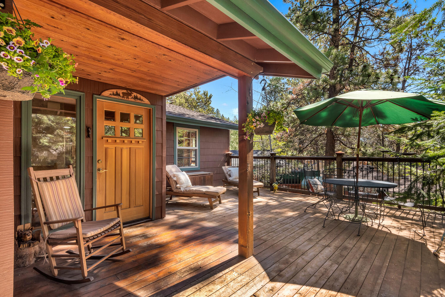 Cabin in the woods! Located in the heart of Bend's Westside. Tucked beneath gracious ponderosa pines, this beautiful custom home features red oak hardwood floors, cherry cabinets, stainless steel appliances, solid wood doors and wood trim. Incredible single level floor plan with a private all inclusive room downstairs with a private bath and entrance. This private retreat has a water feature, multiple outdoor paver courtyards and private decks including a wood burning fireplace. The huge 45 ft deep paver driveway features covered RV parking and leads to an oversized 3 car garage with pull through garage doors on one side for additional RV or toy parking. A workshop and multiple storage buildings complete the unique oasis.